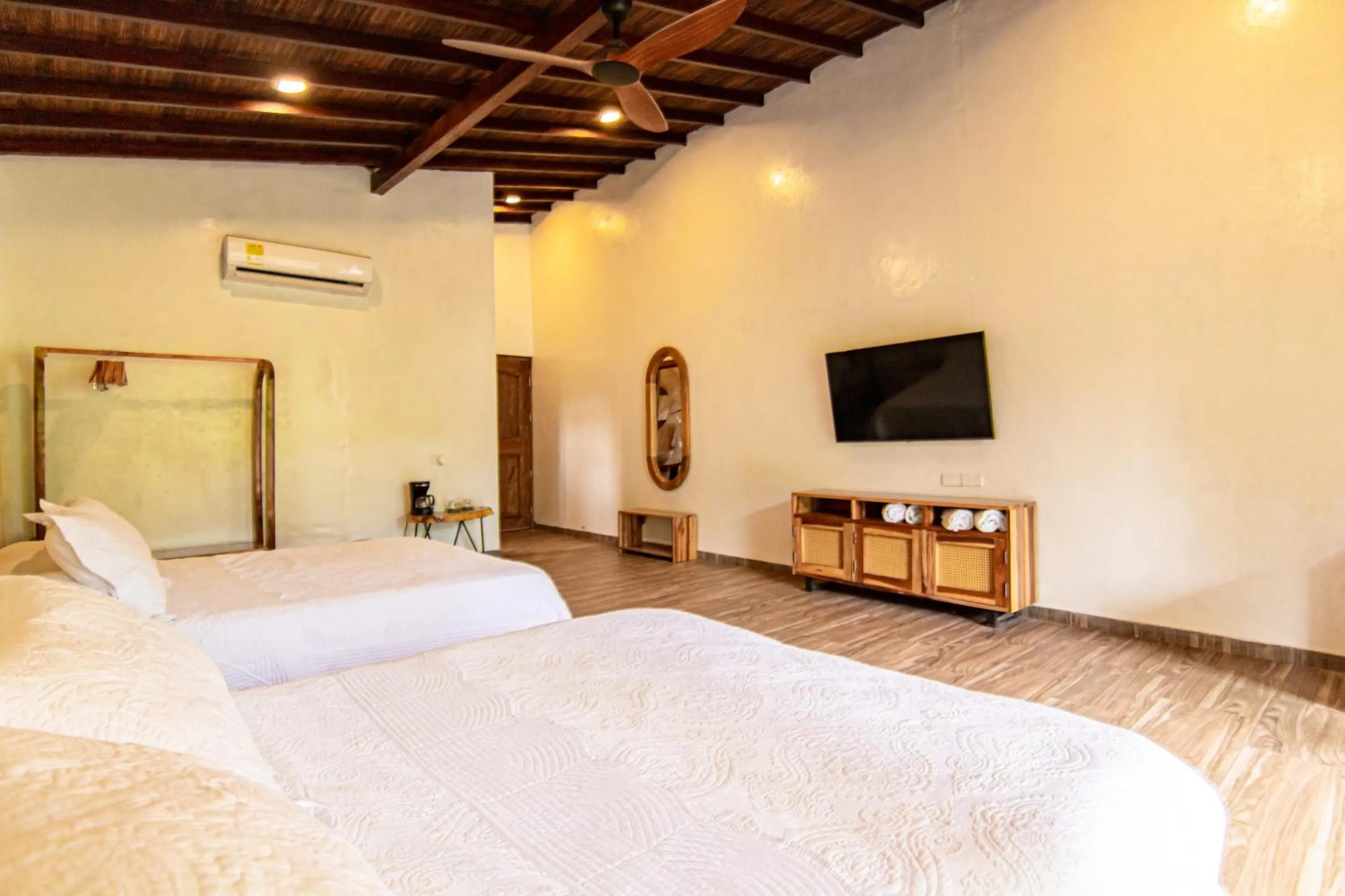 Photo of the whole room, Bed in Portales del Tayrona Garden Hotel