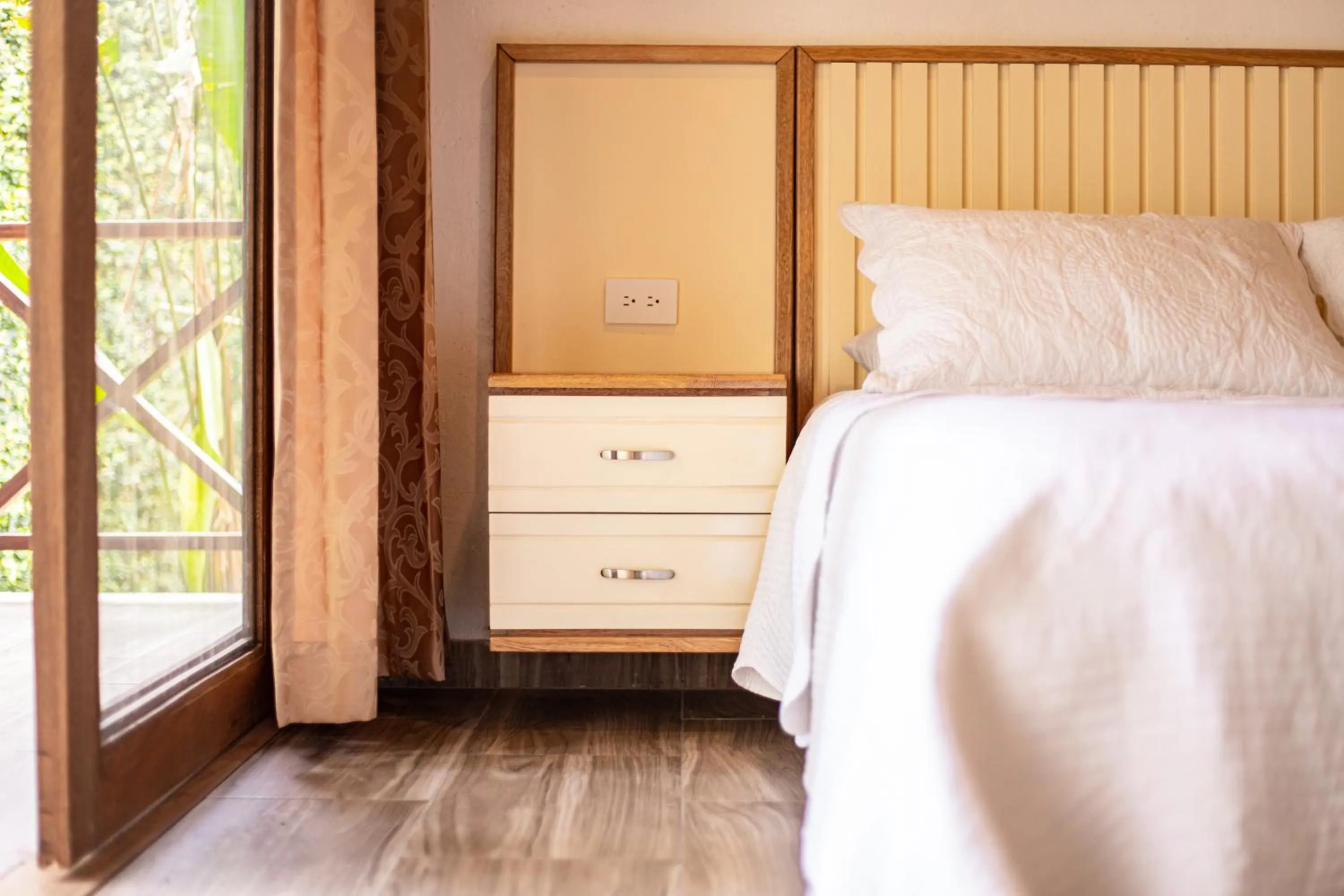 Bed in Portales del Tayrona Garden Hotel