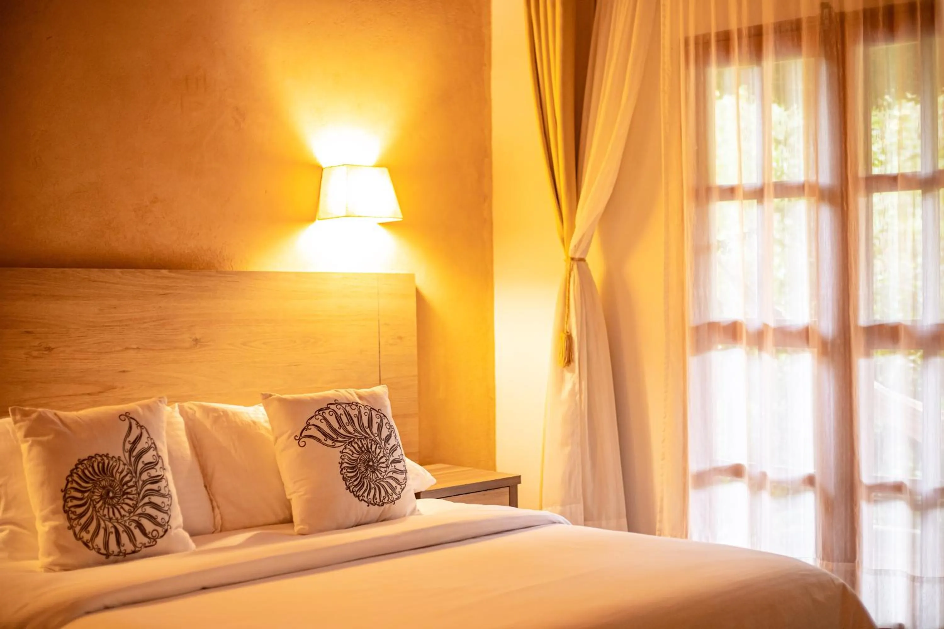 Bed in Portales del Tayrona Garden Hotel