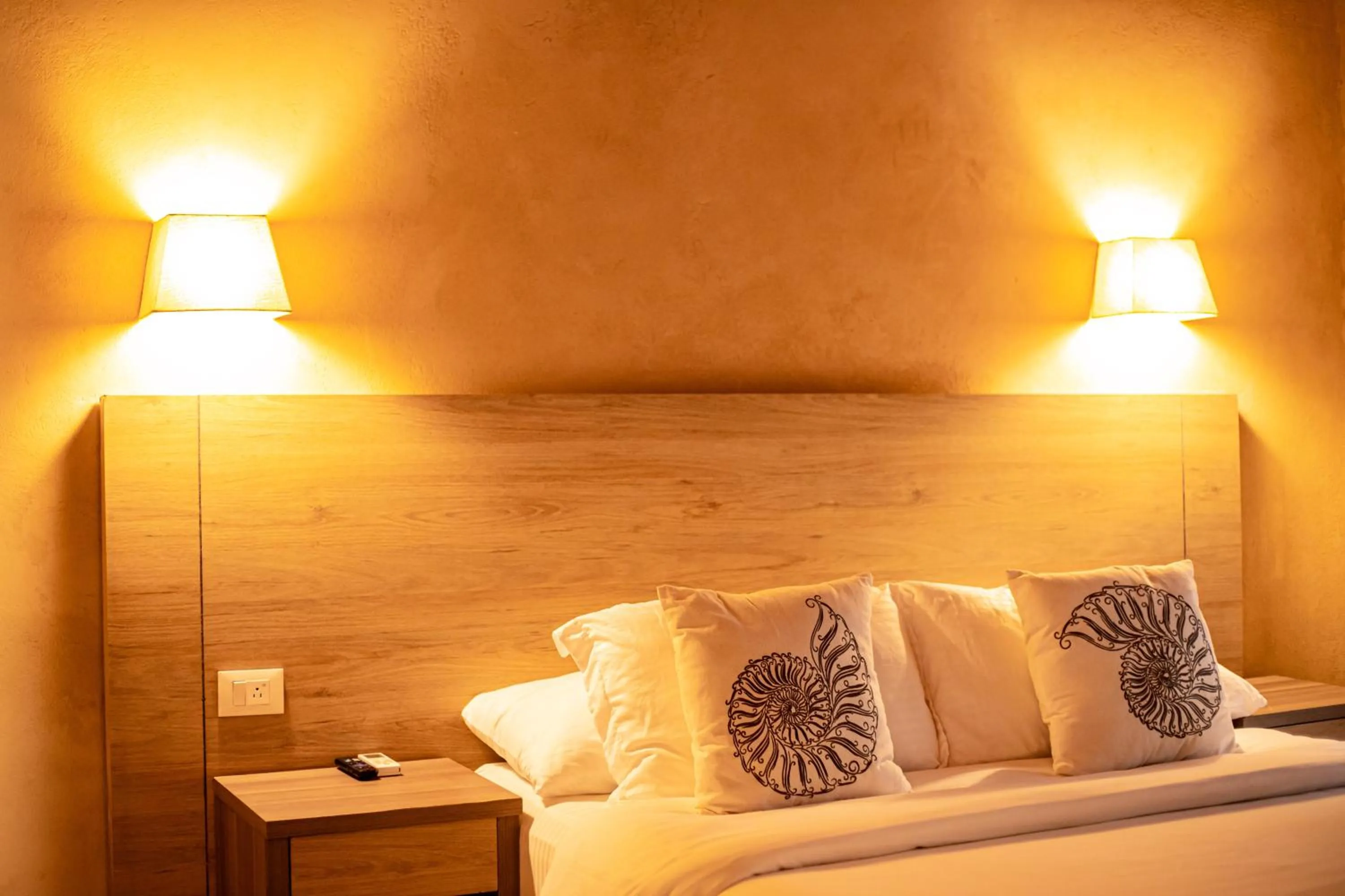 Bed in Portales del Tayrona Garden Hotel