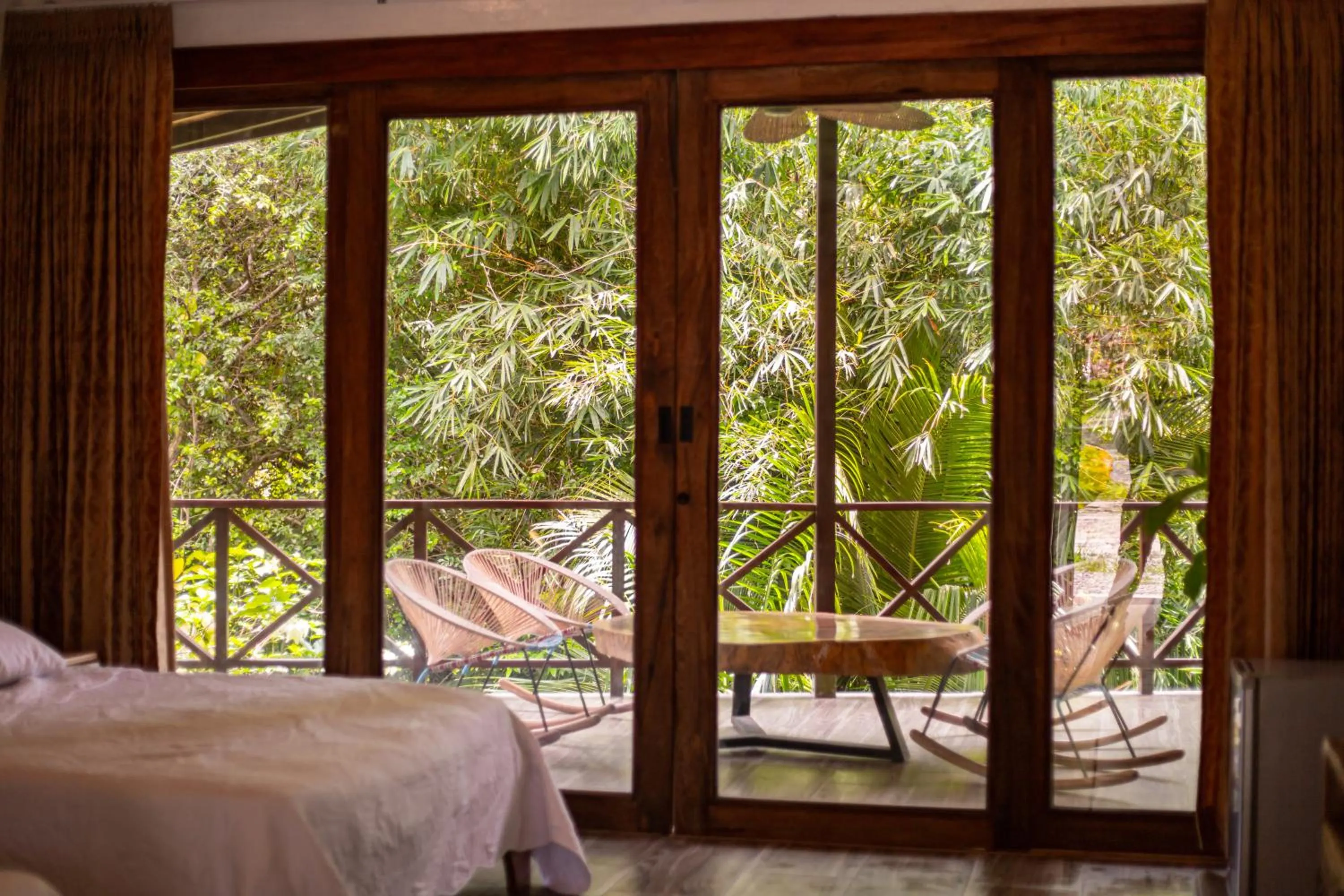 Balcony/Terrace, Bed in Portales del Tayrona Garden Hotel