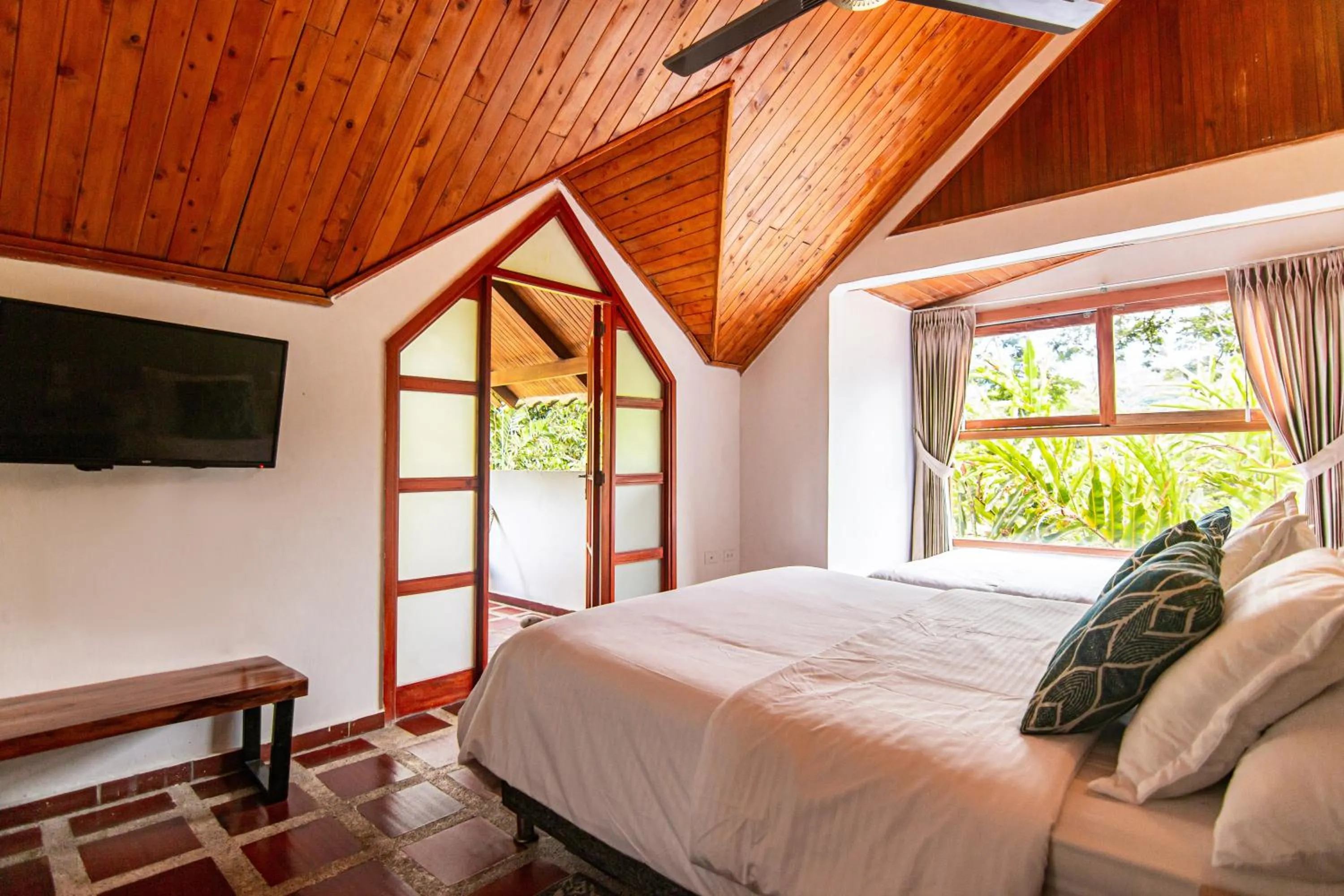 Bed in Portales del Tayrona Garden Hotel