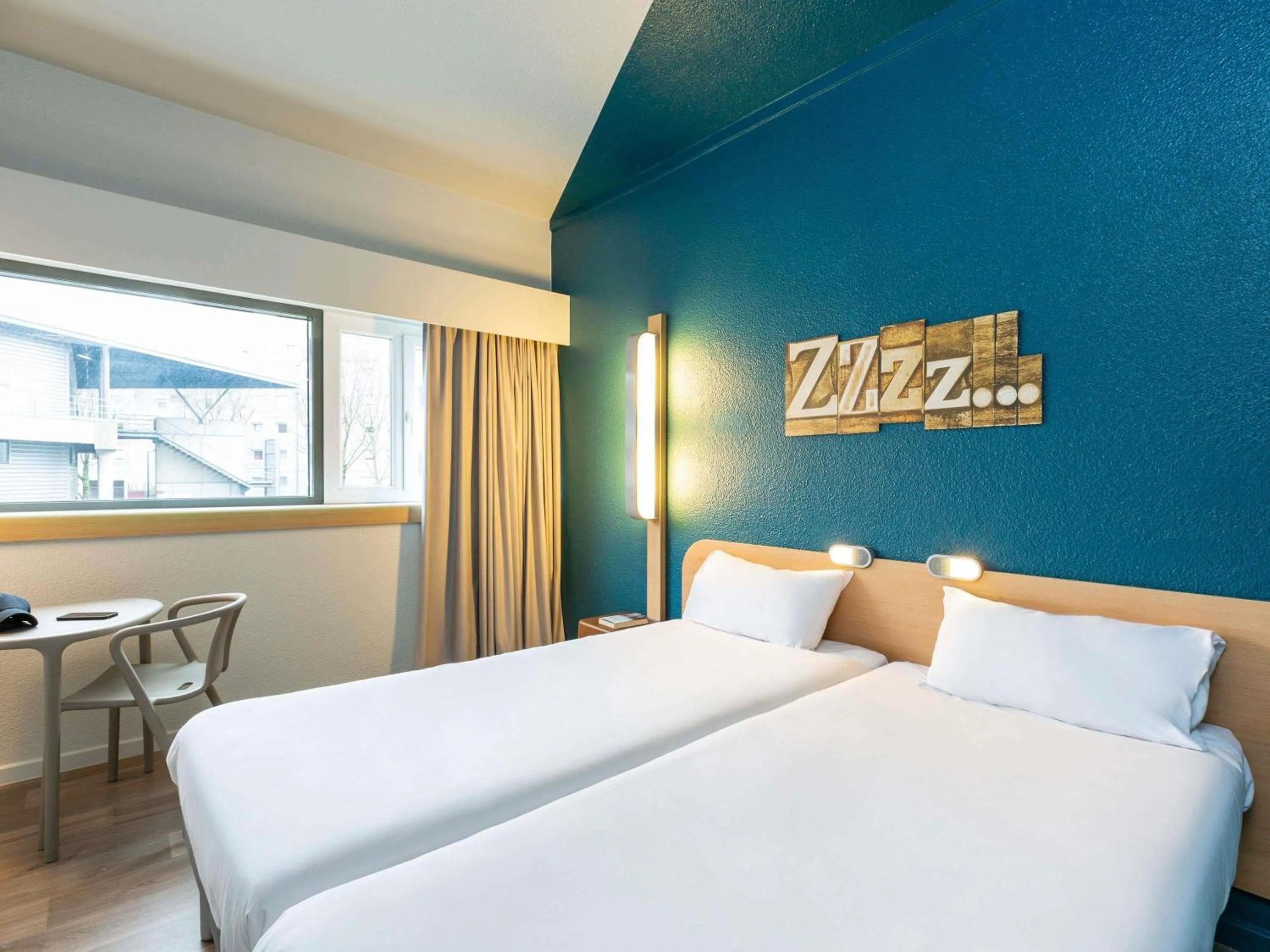 Bedroom, Bed in ibis budget Paris Porte de Pantin