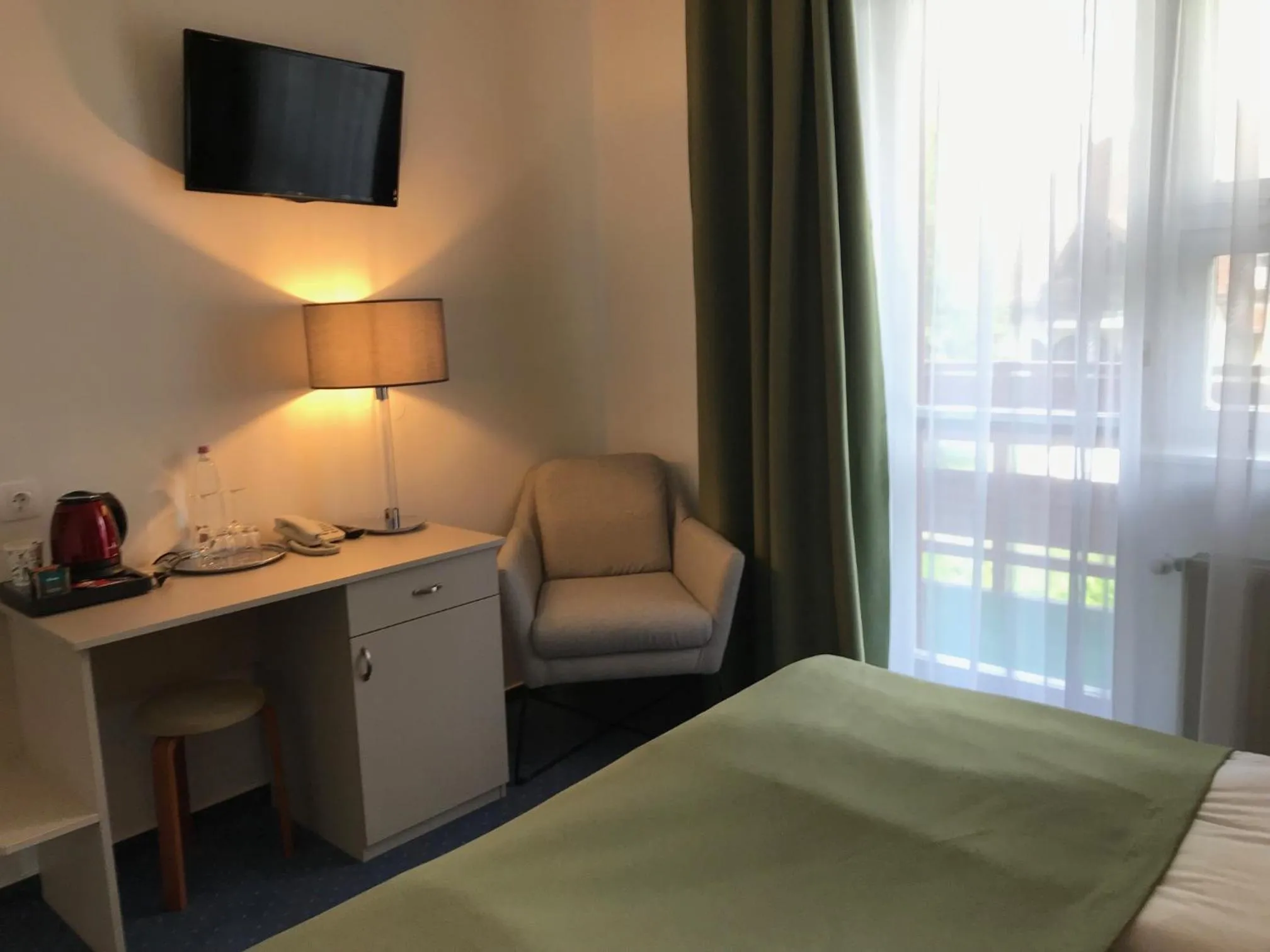 Photo of the whole room, Bed in Zsanett Hotel