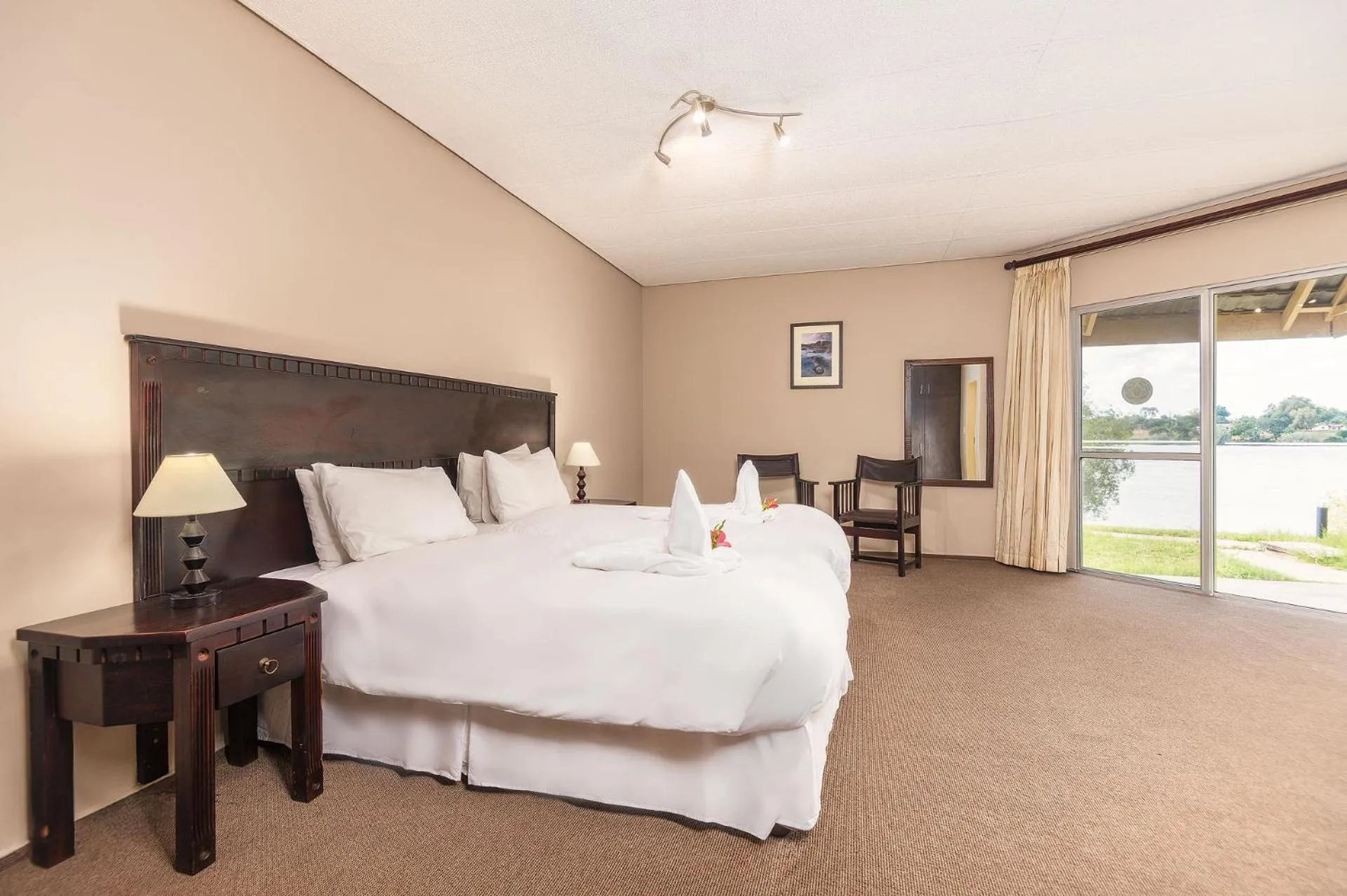 Bed in Protea Hotel by Marriott Zambezi River Lodge