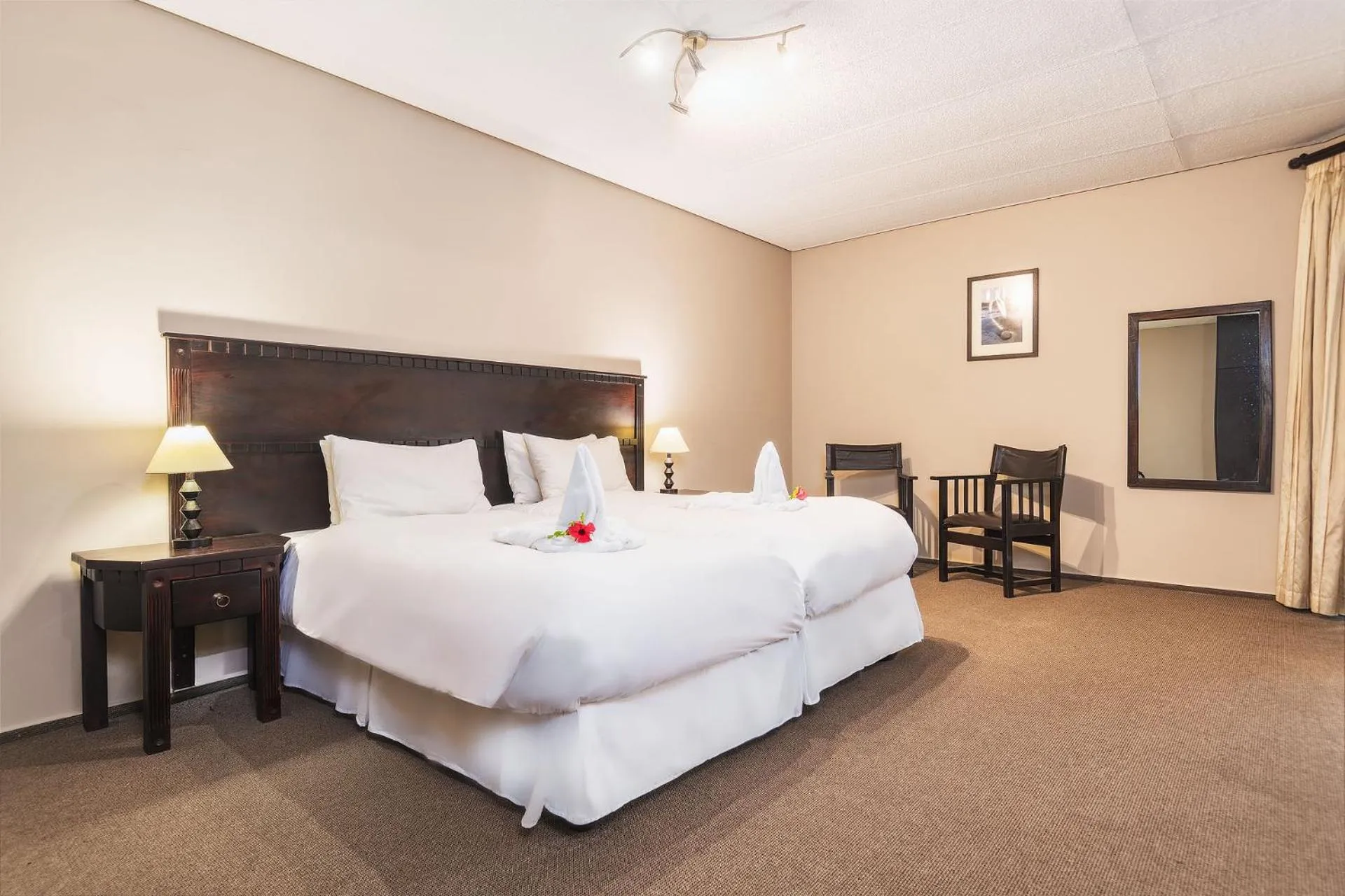 Bed in Protea Hotel by Marriott Zambezi River Lodge