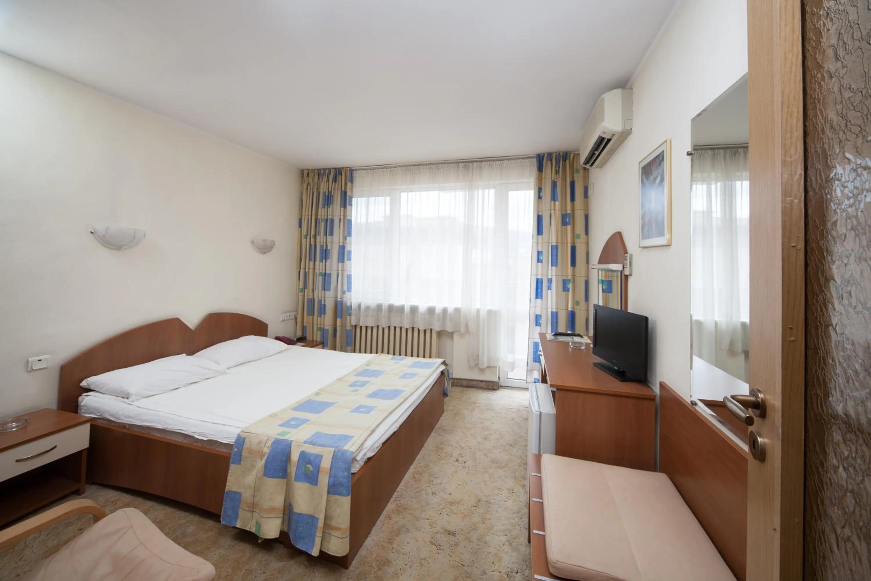 Photo of the whole room, Bed in Slavyanska Beseda Hotel