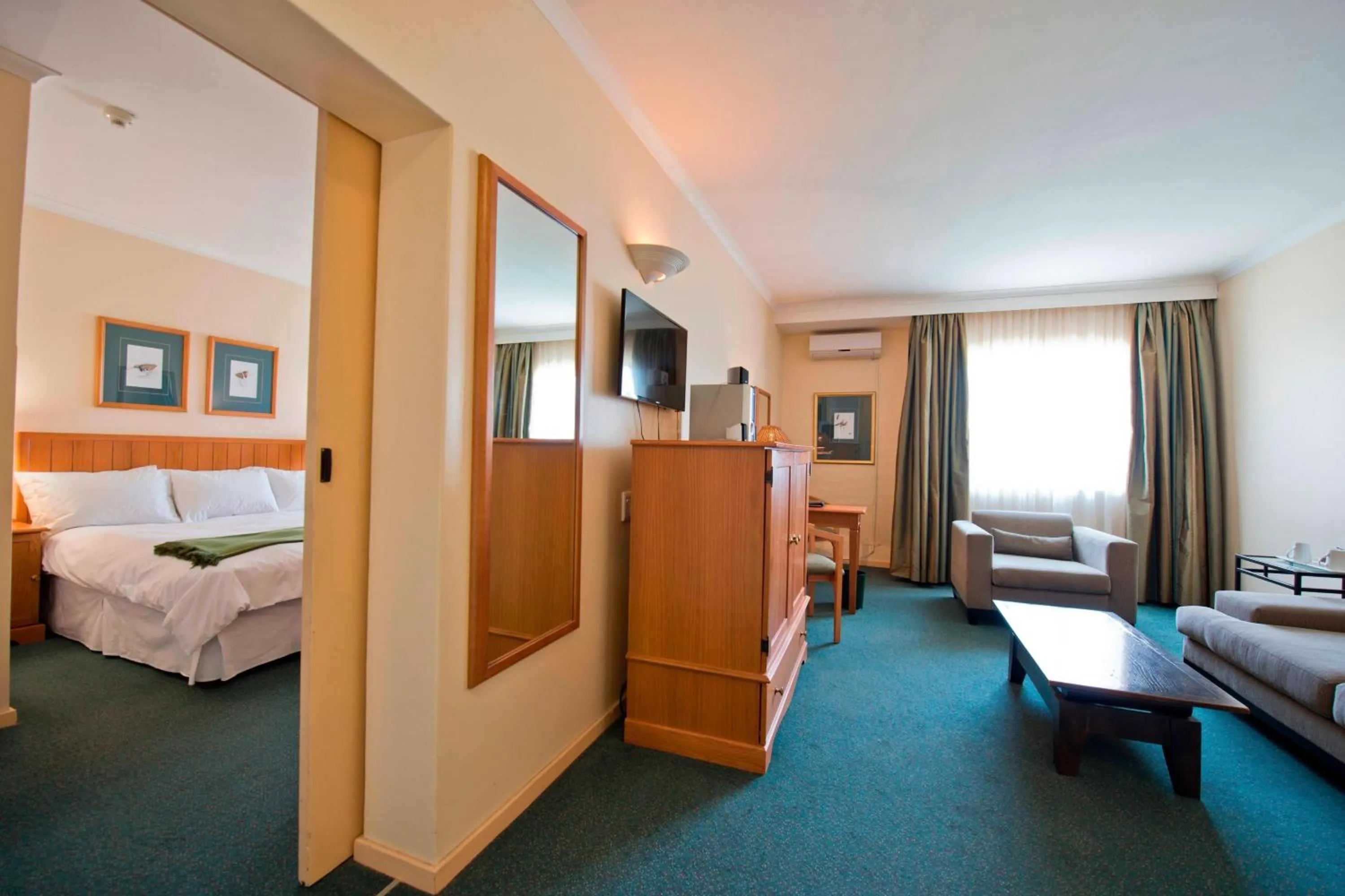 Living room, Bed in Protea Hotel by Marriott Ondangwa