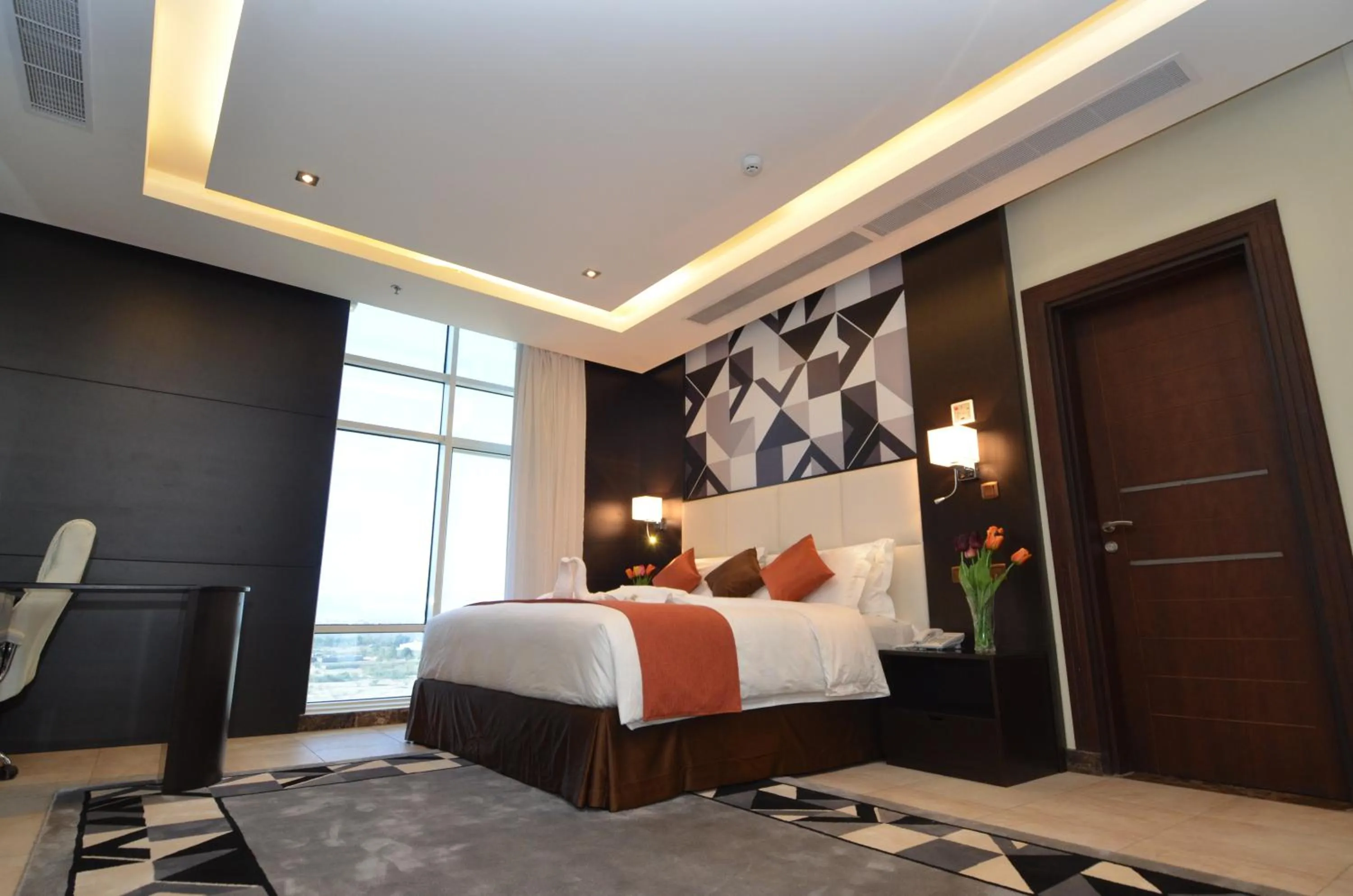 Bed in Bayat Suites