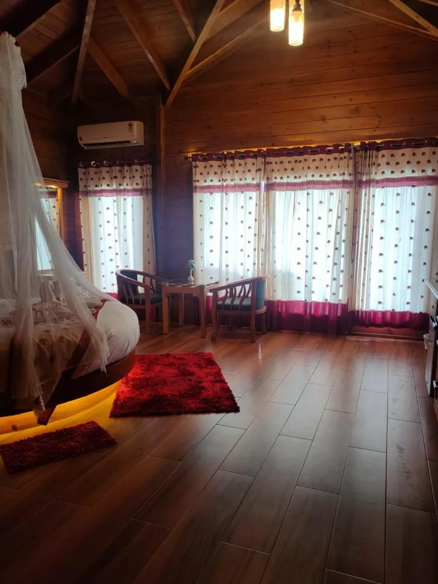 Bed in LakeRose Wayanad Resort