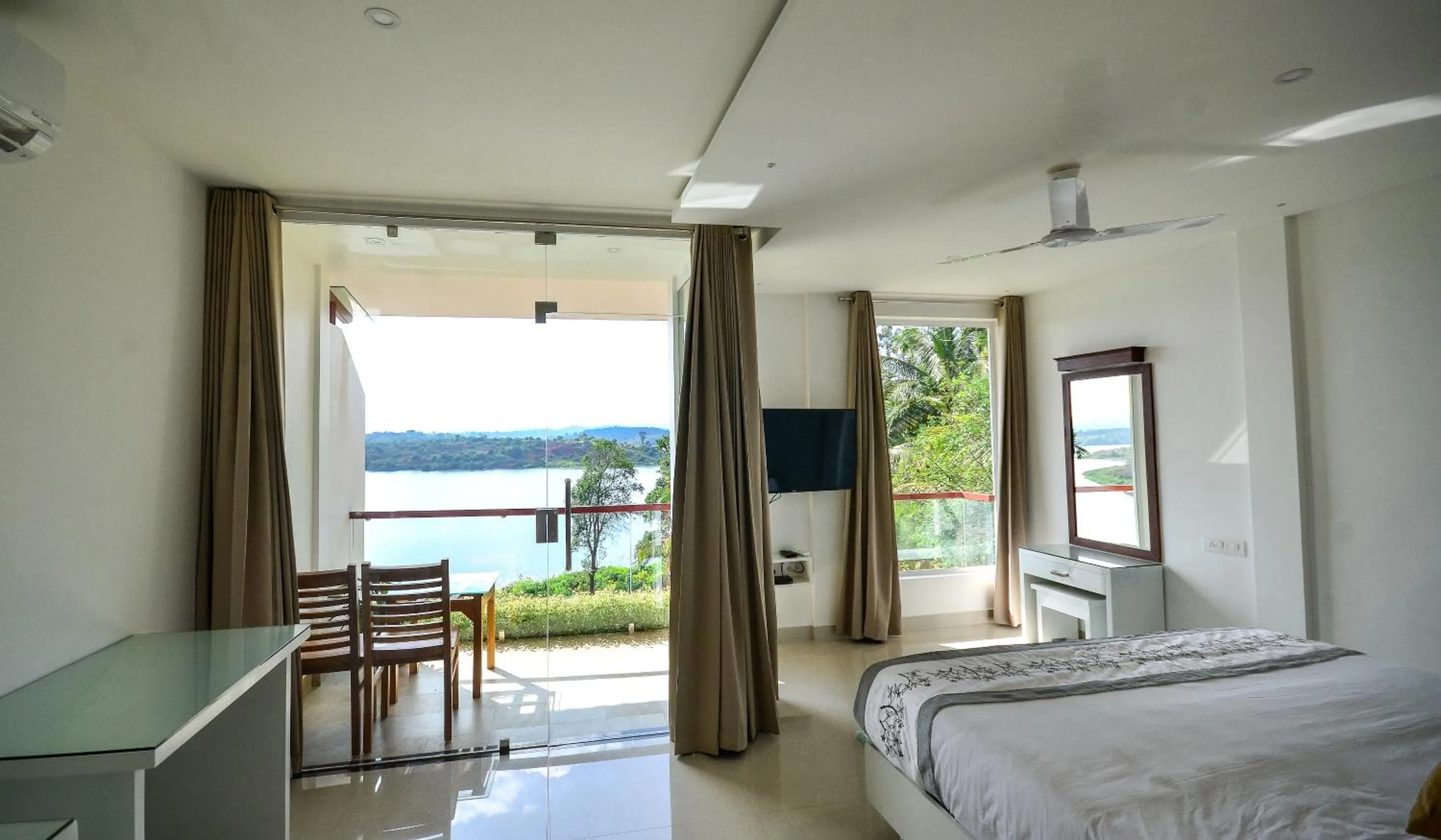 Bed in LakeRose Wayanad Resort