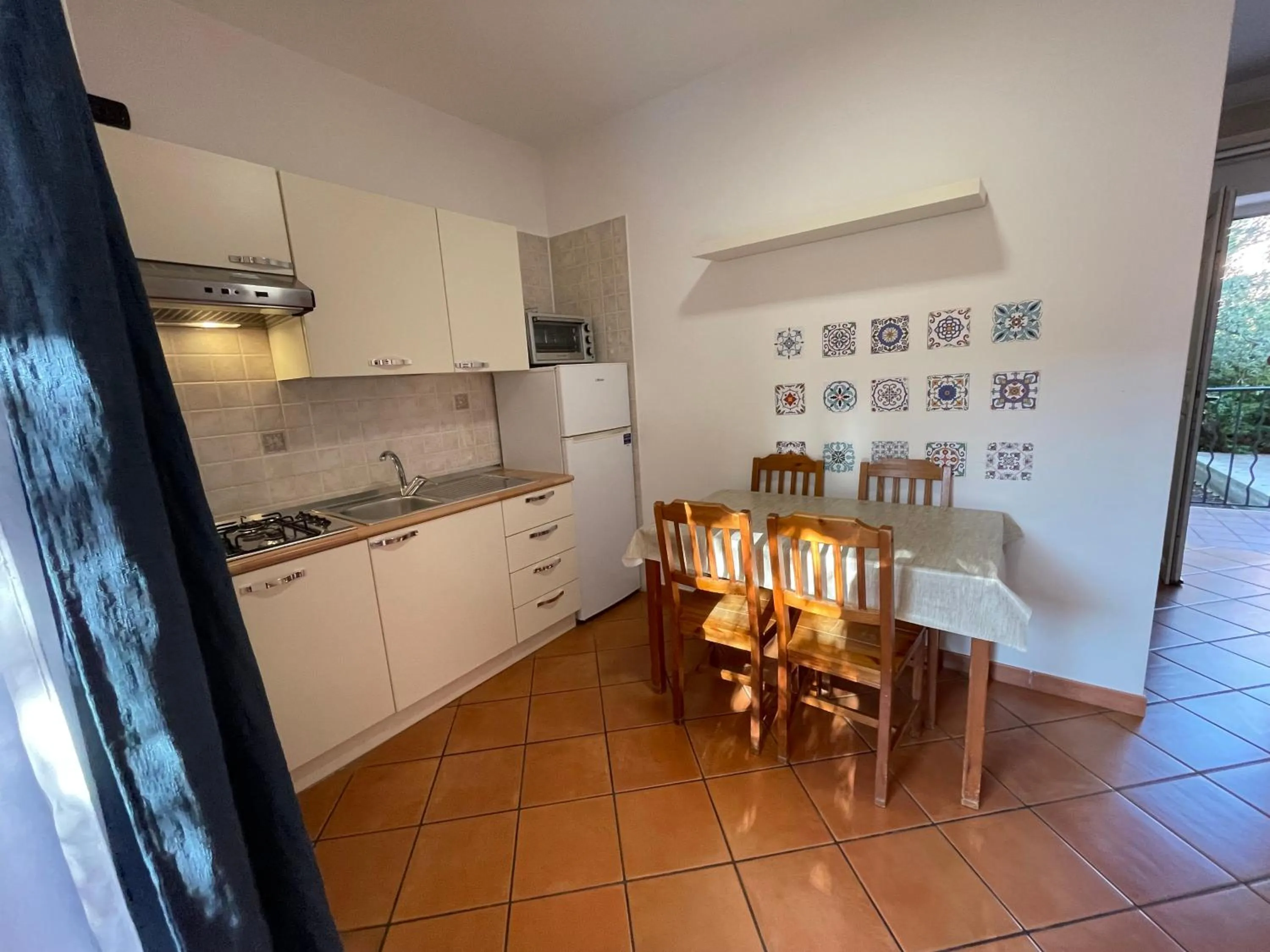 Kitchen or kitchenette in Residence Villa Andrea