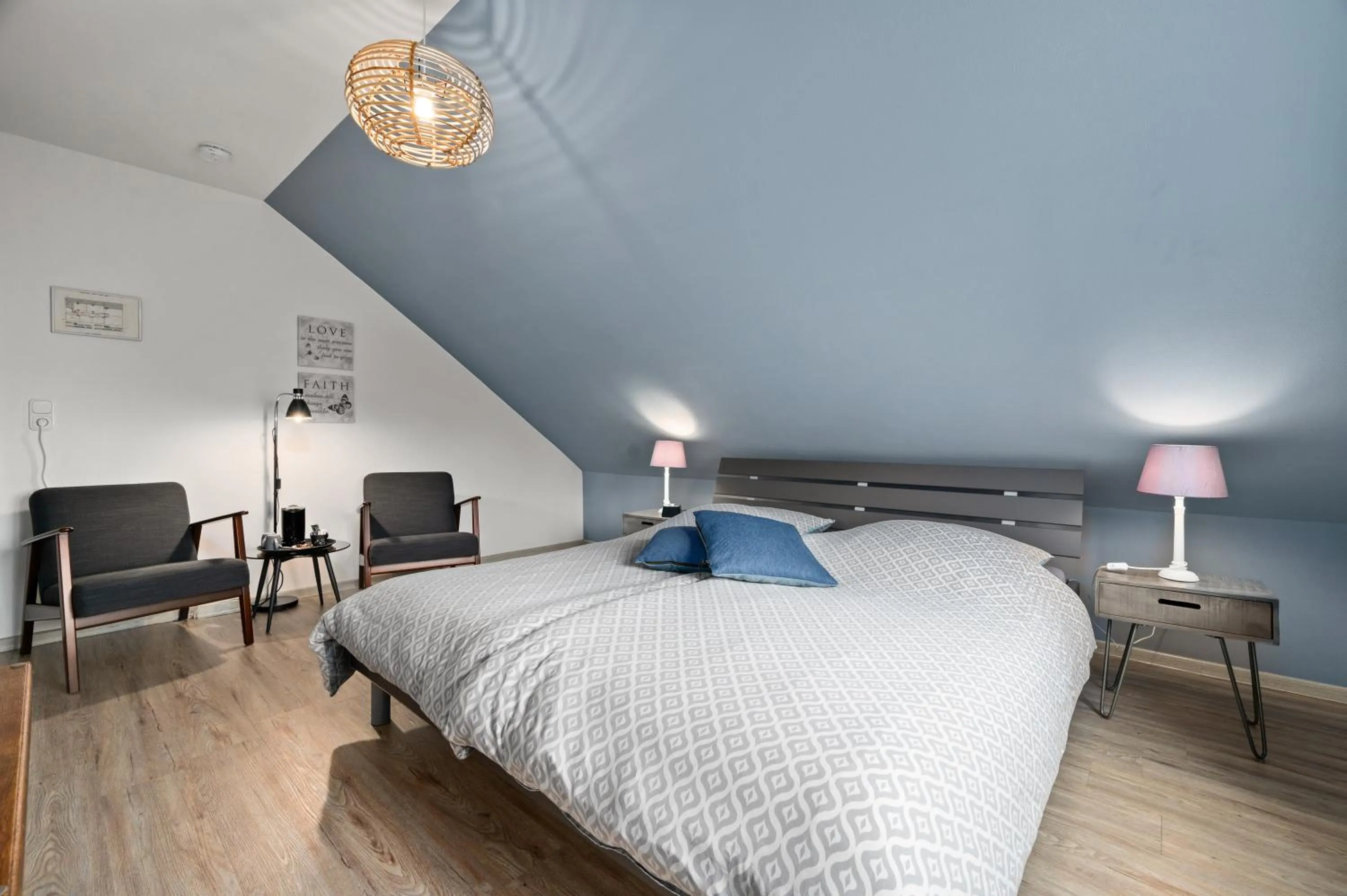 Seating area, Bed in Gästehaus Hoxel