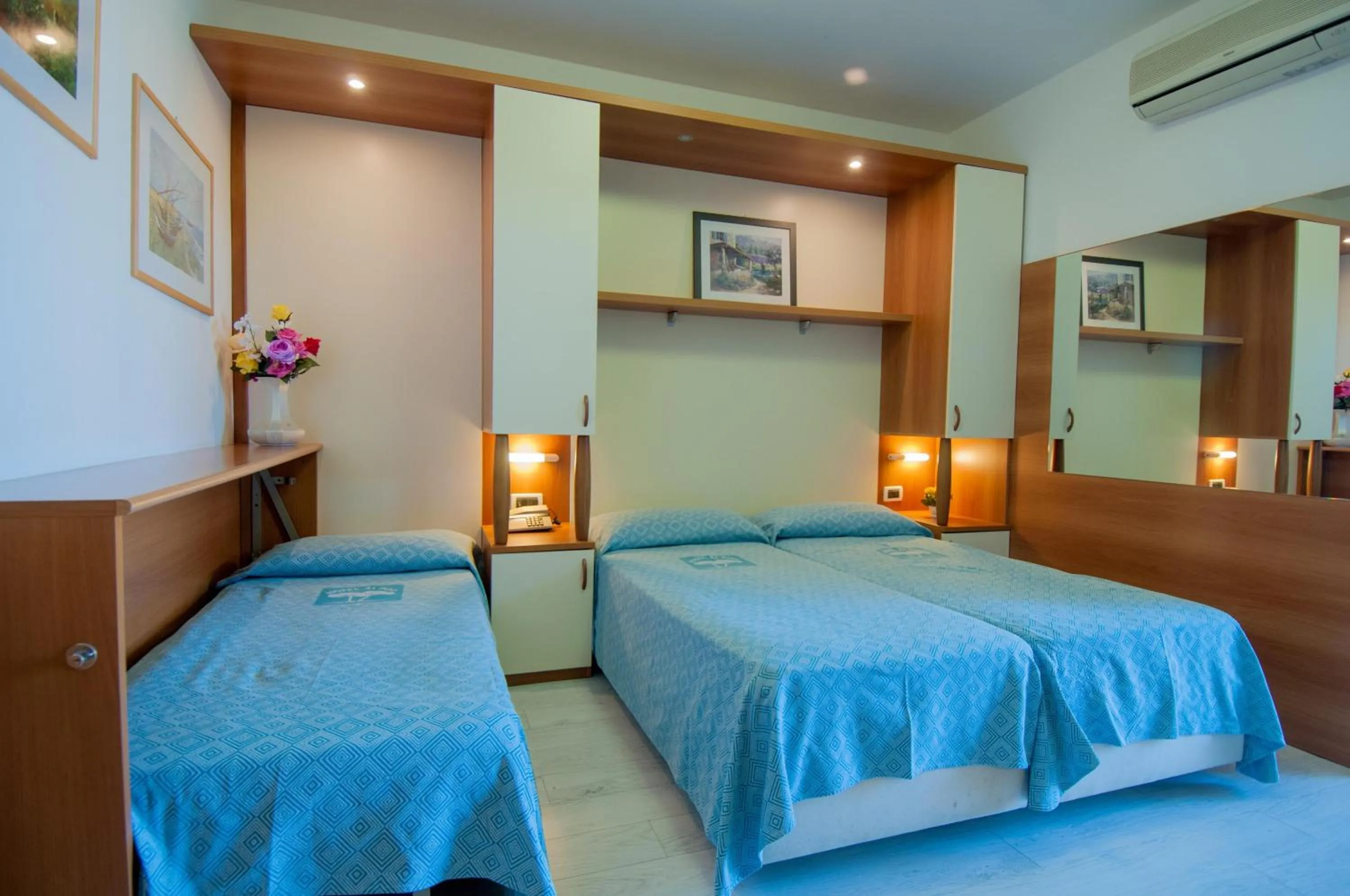 Bed in Hotel Ai Pini