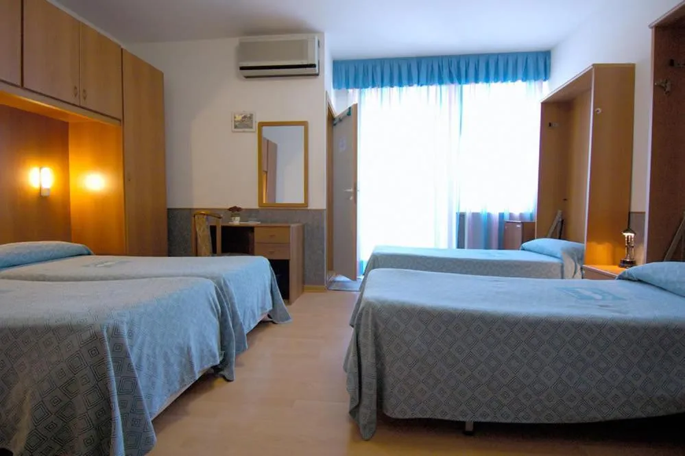 Bed in Hotel Ai Pini