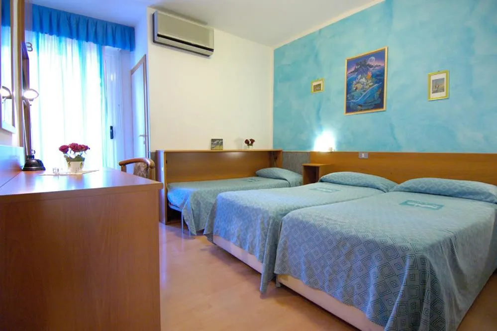 Bed in Hotel Ai Pini