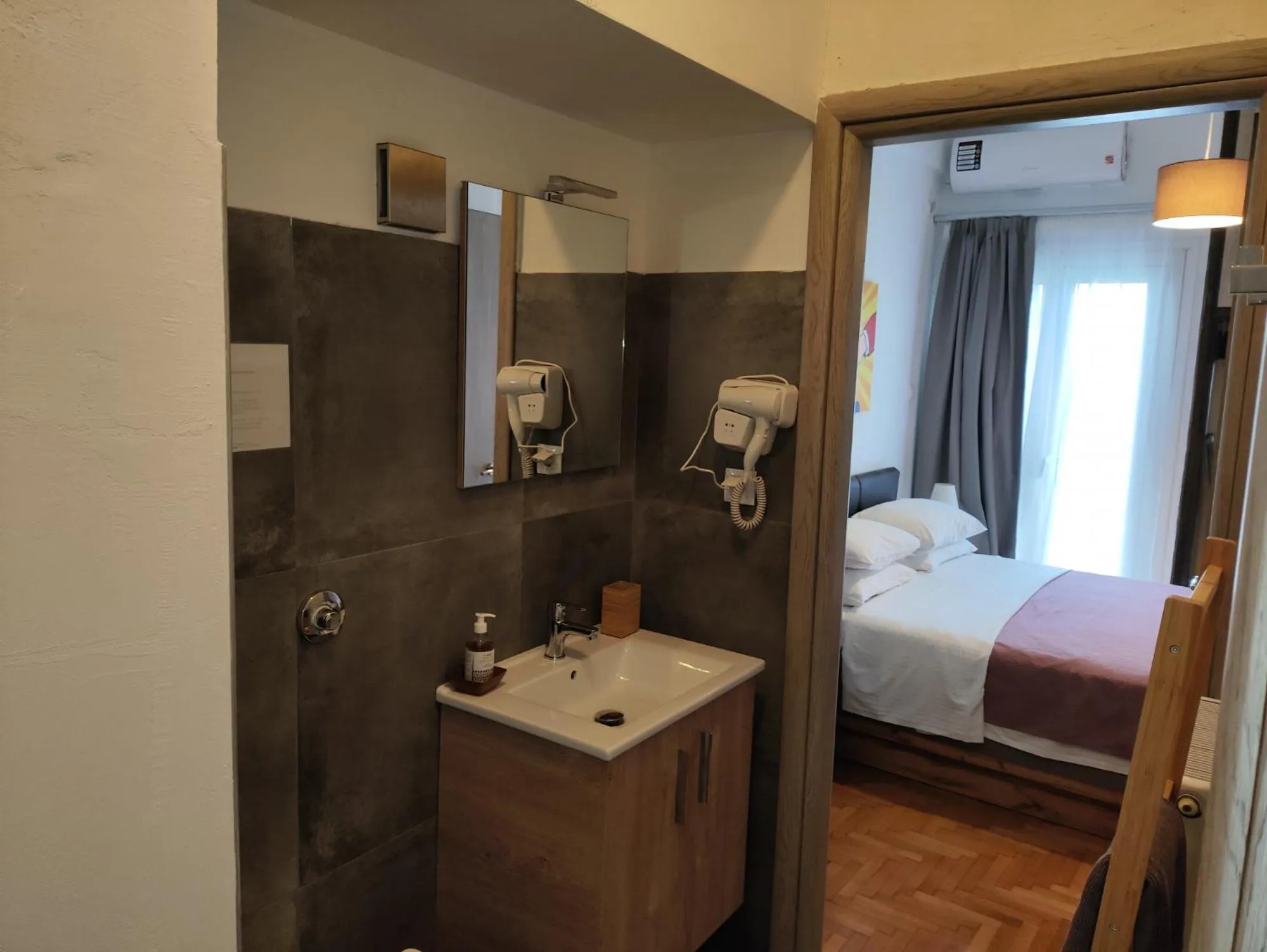 Bathroom, Bed in Ulysses Apartments Acropolis