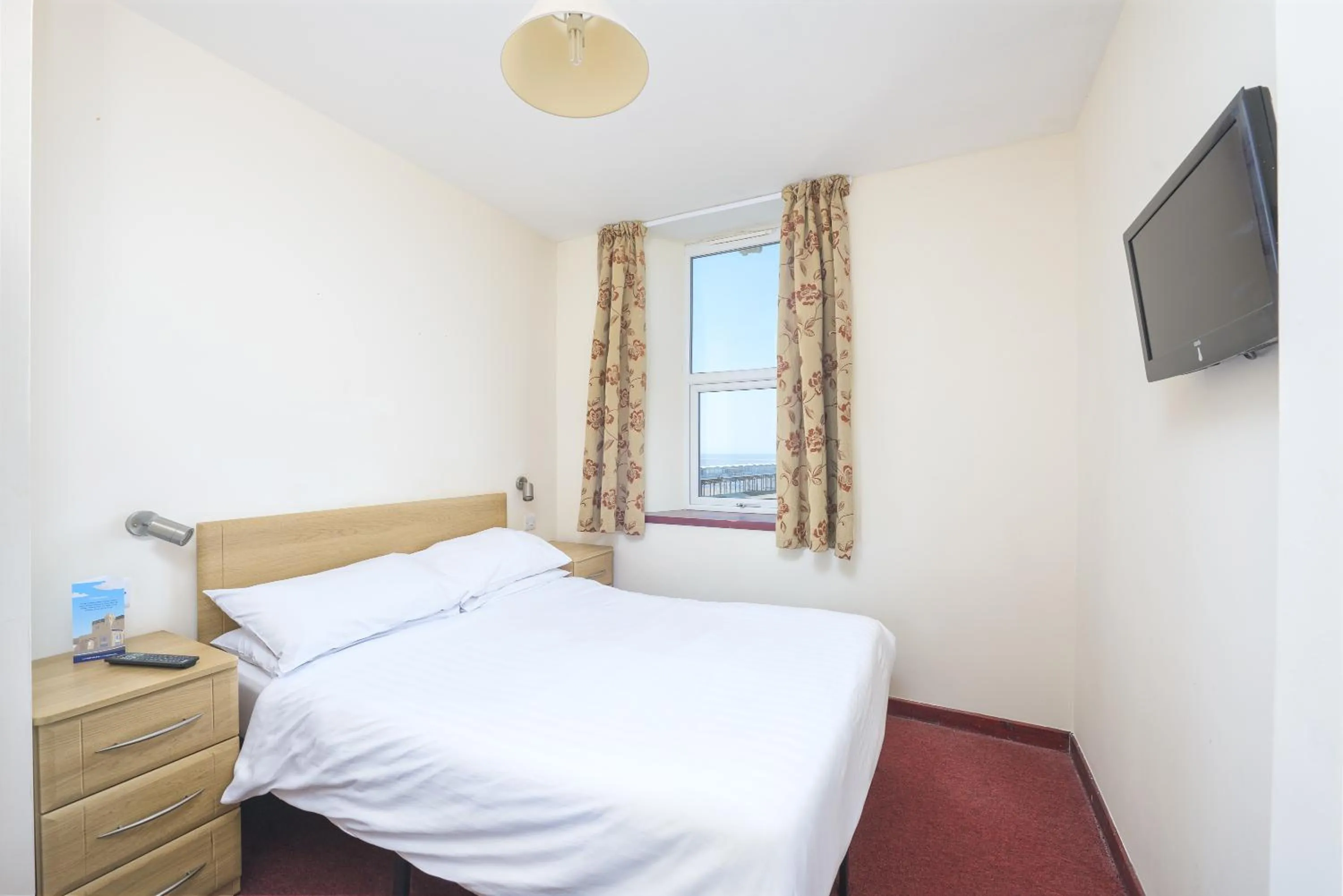 Bed in The Sandringham Hotel