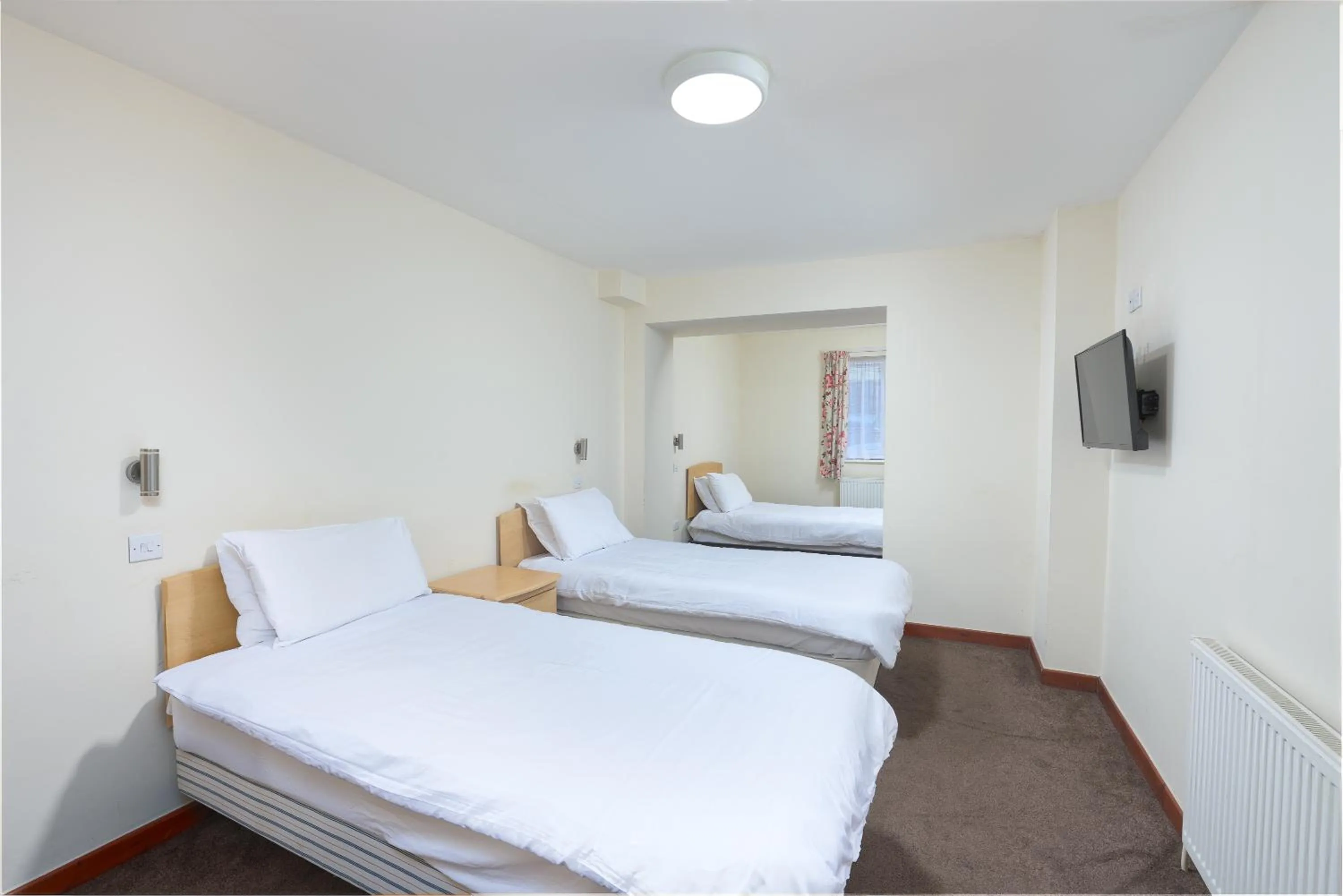 Bed in The Sandringham Hotel