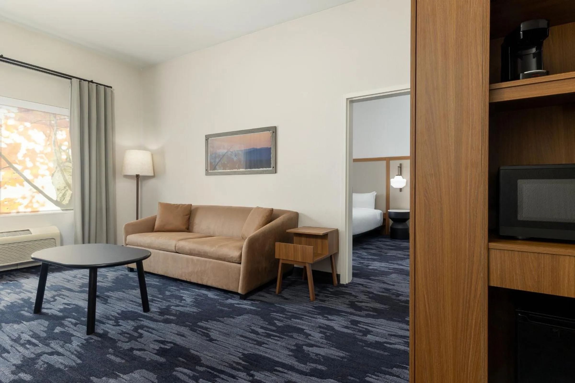 Living room, Bed in Fairfield by Marriott Inn & Suites Spokane Airport