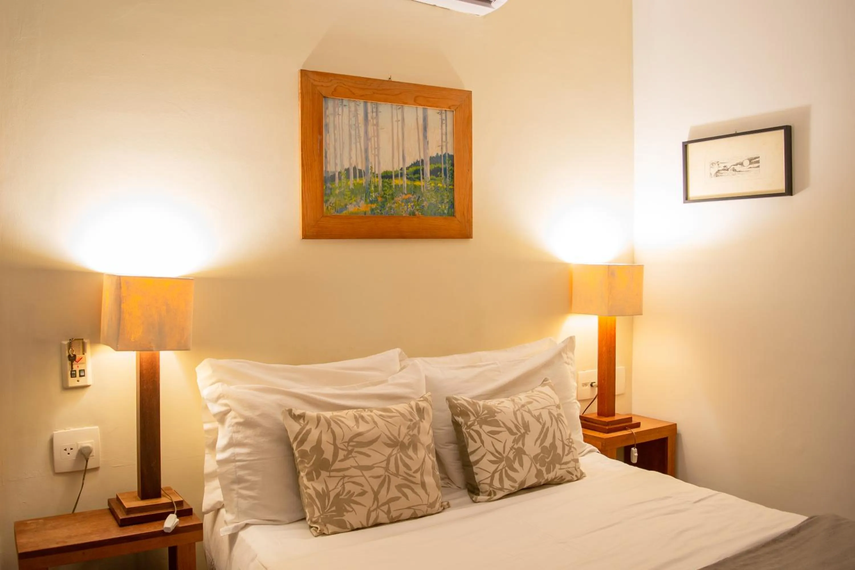 Bed in Pousada da Cyssa