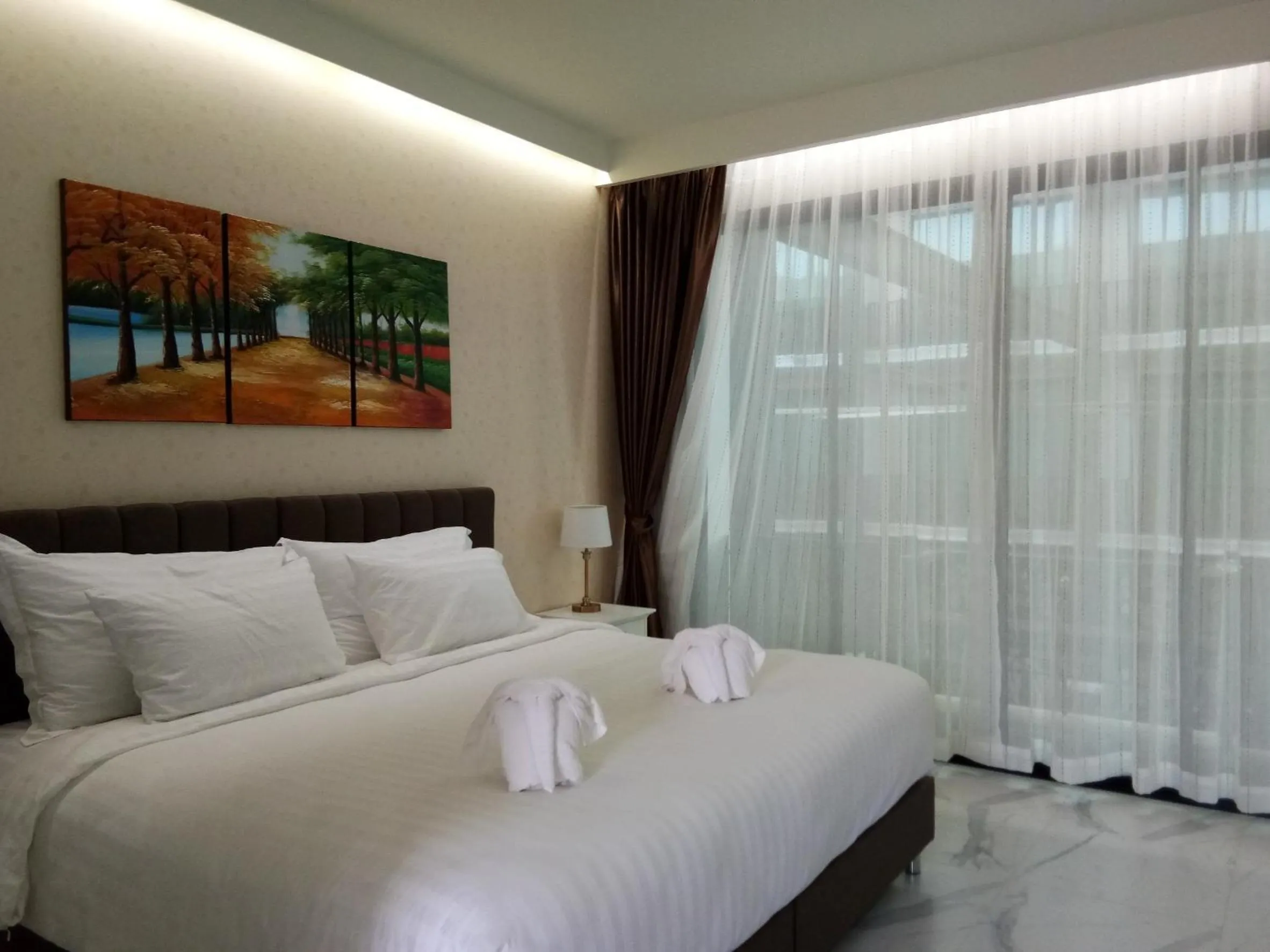 Photo of the whole room, Bed in Namthong Nan Hotel