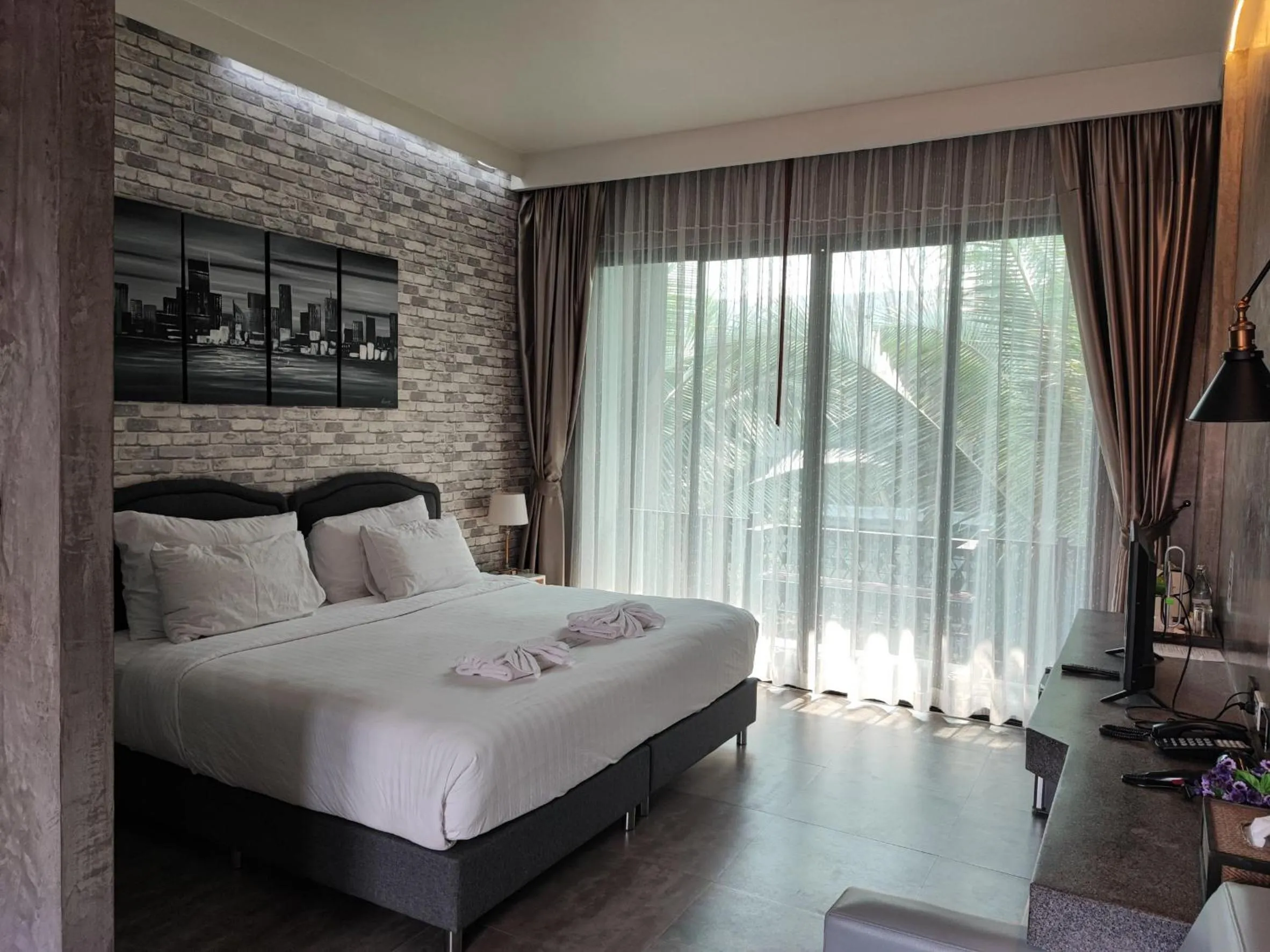 Bed in Namthong Nan Hotel