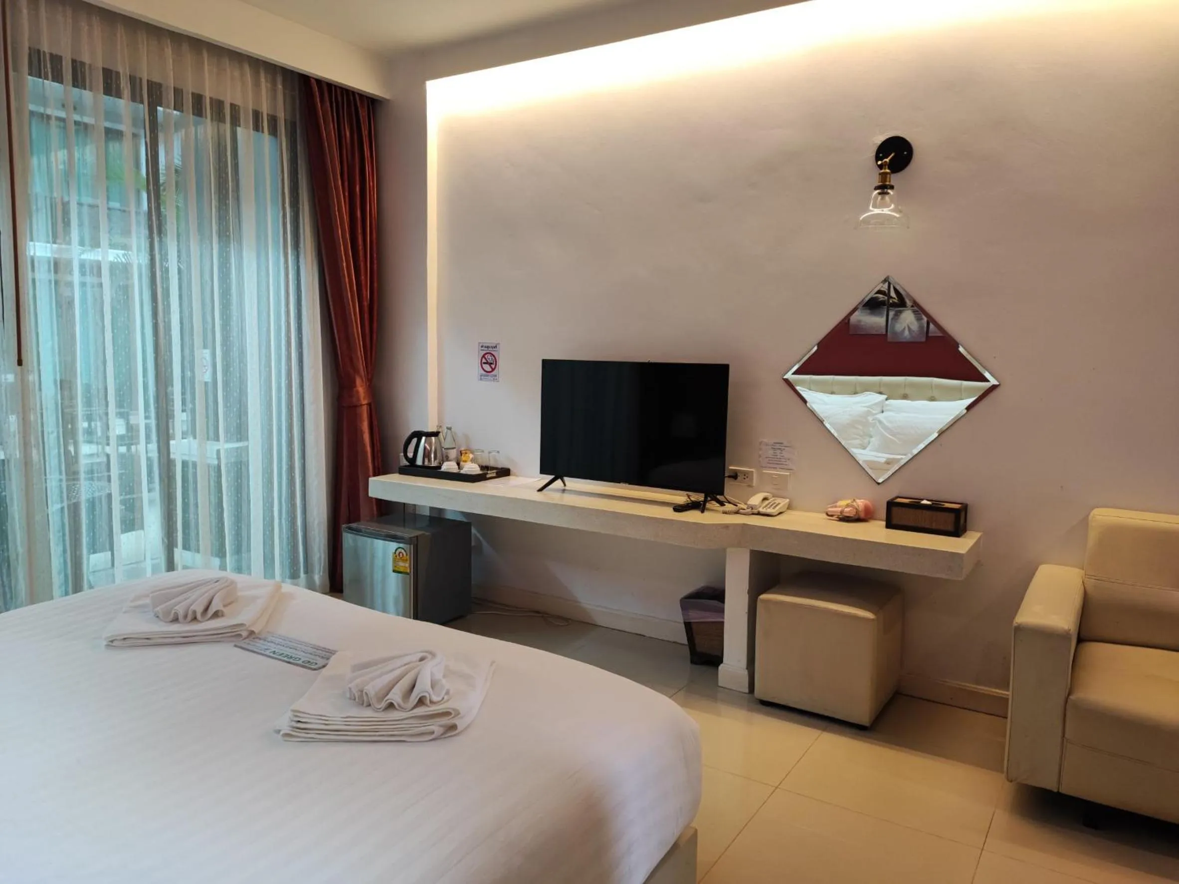 Bed in Namthong Nan Hotel