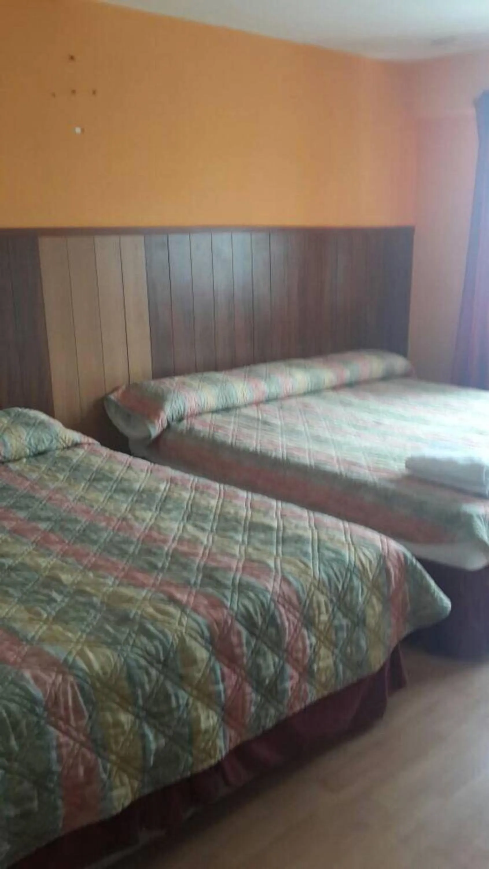 Bed in Golden Night Hotel Cameron Highlands