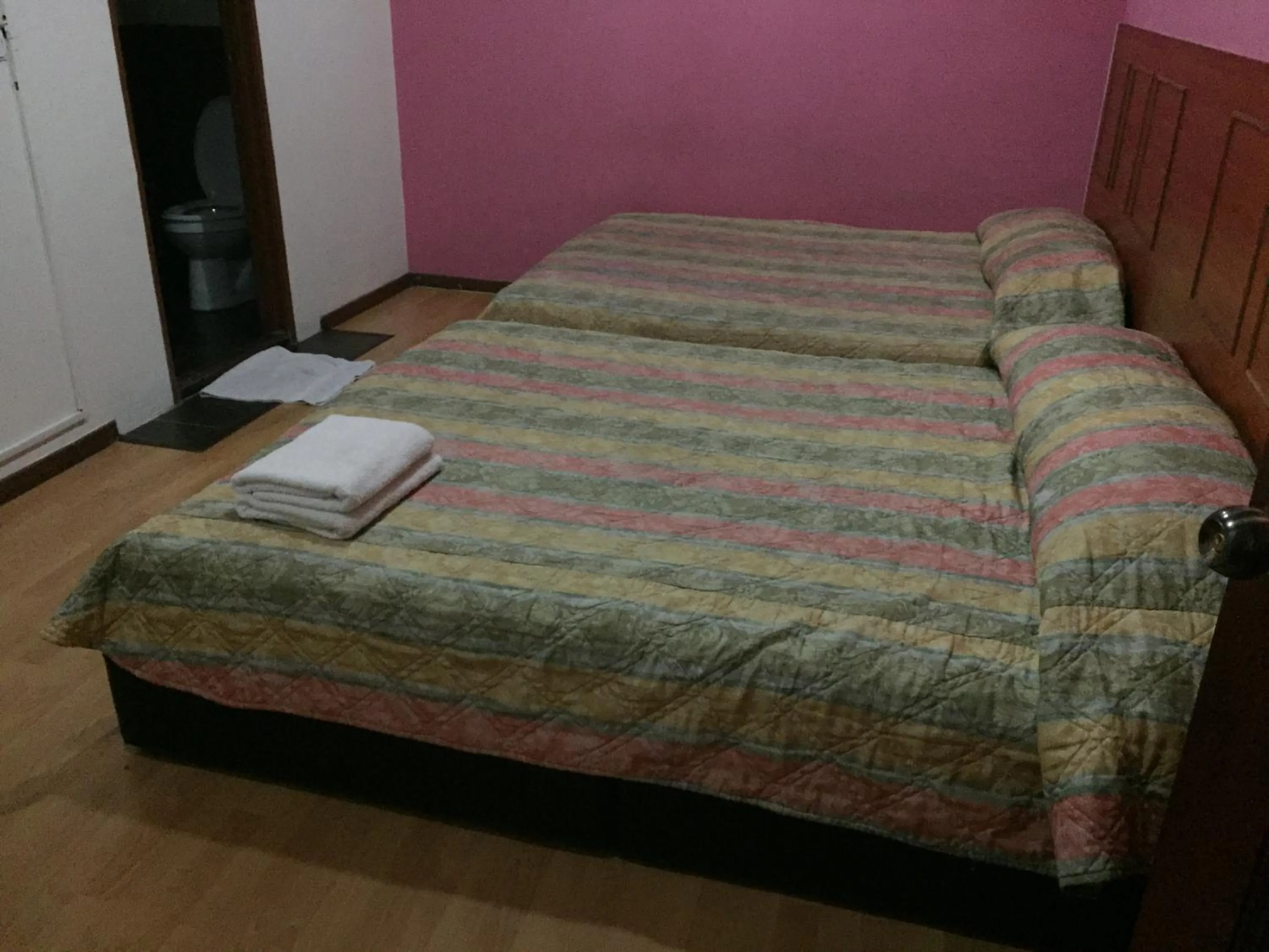 Bed in Golden Night Hotel Cameron Highlands