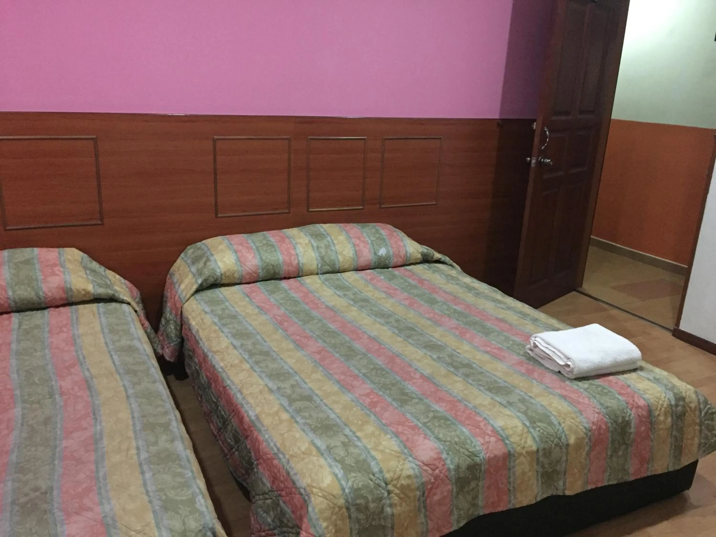 Bed in Golden Night Hotel Cameron Highlands