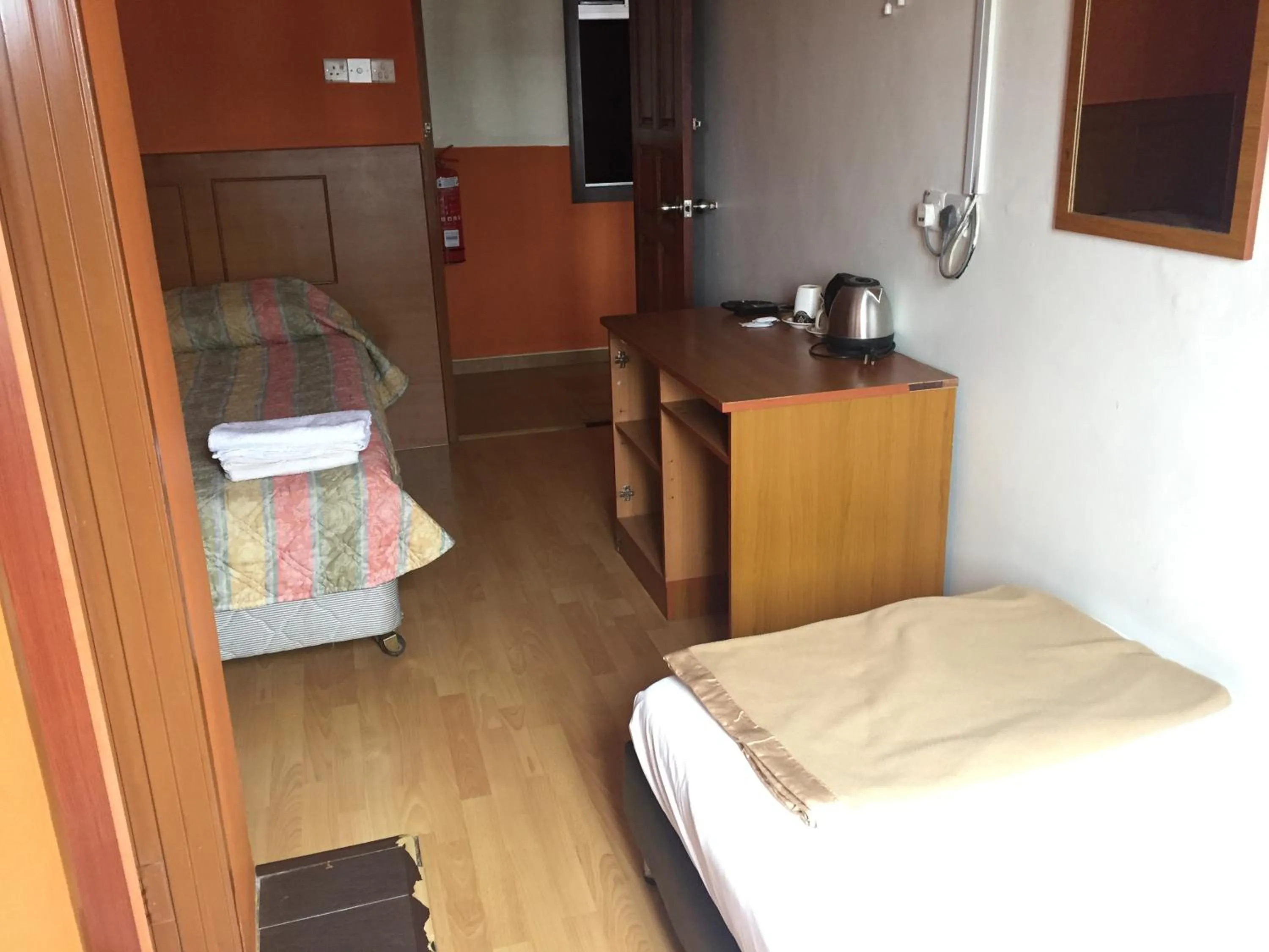 Bed in Golden Night Hotel Cameron Highlands