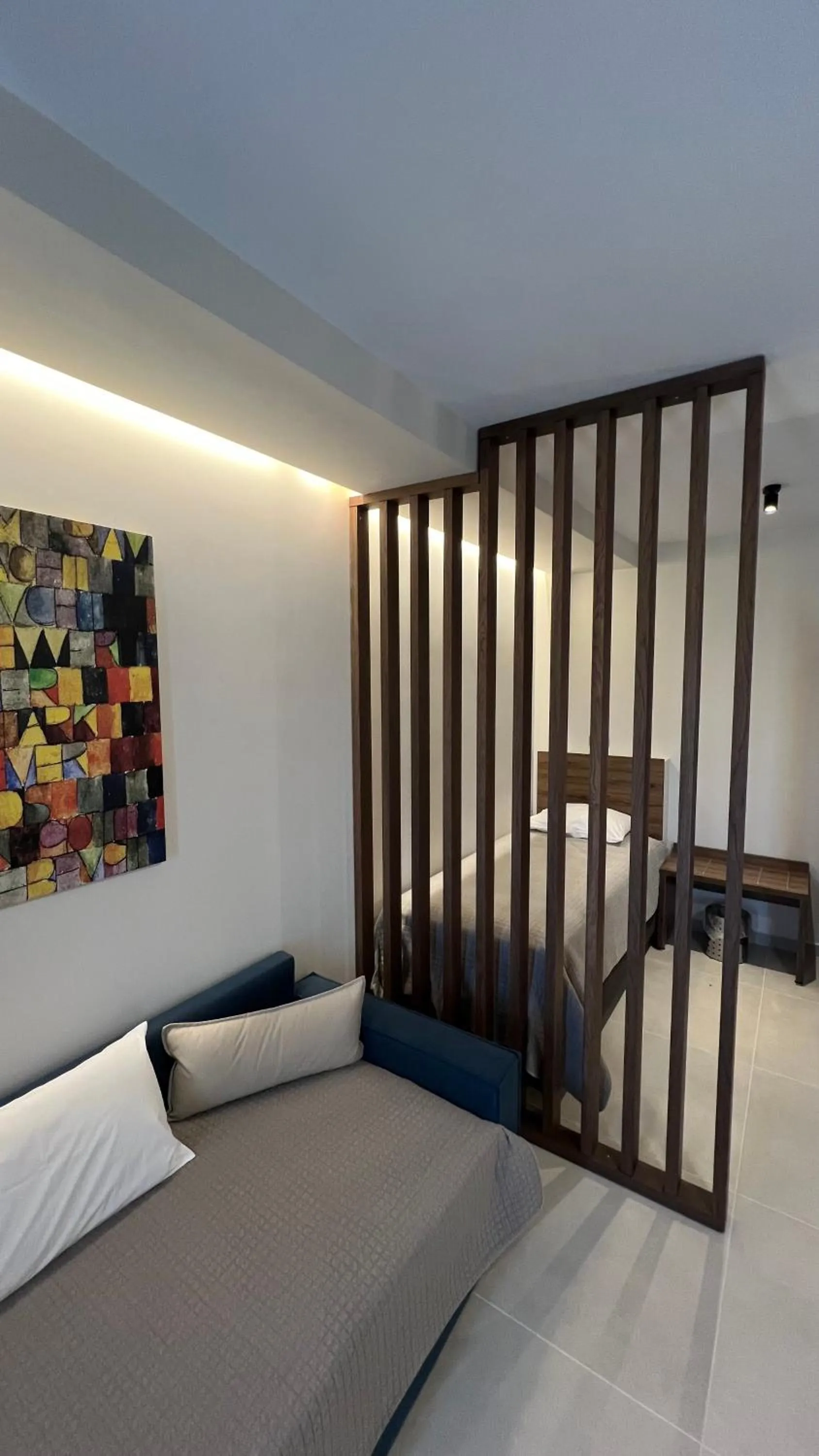 Seating area, Bed in Sunset Hotel