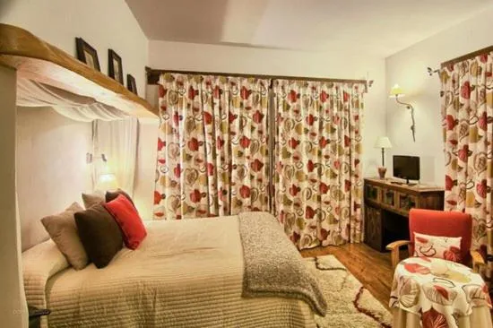 Bed in Hotel Llano Tineo