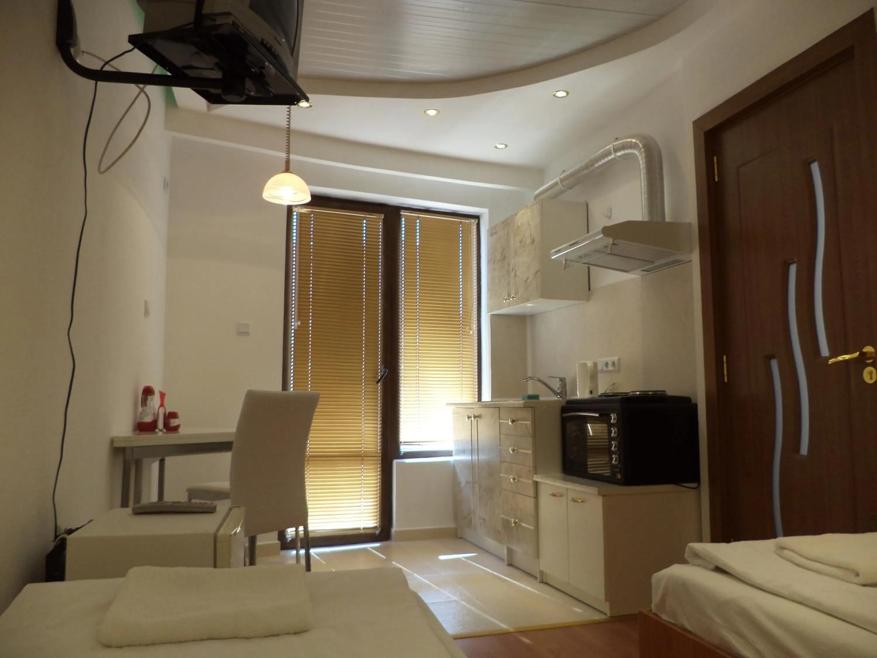 Kitchen or kitchenette, Bed in FAMILY HOTEL SAINT PETER