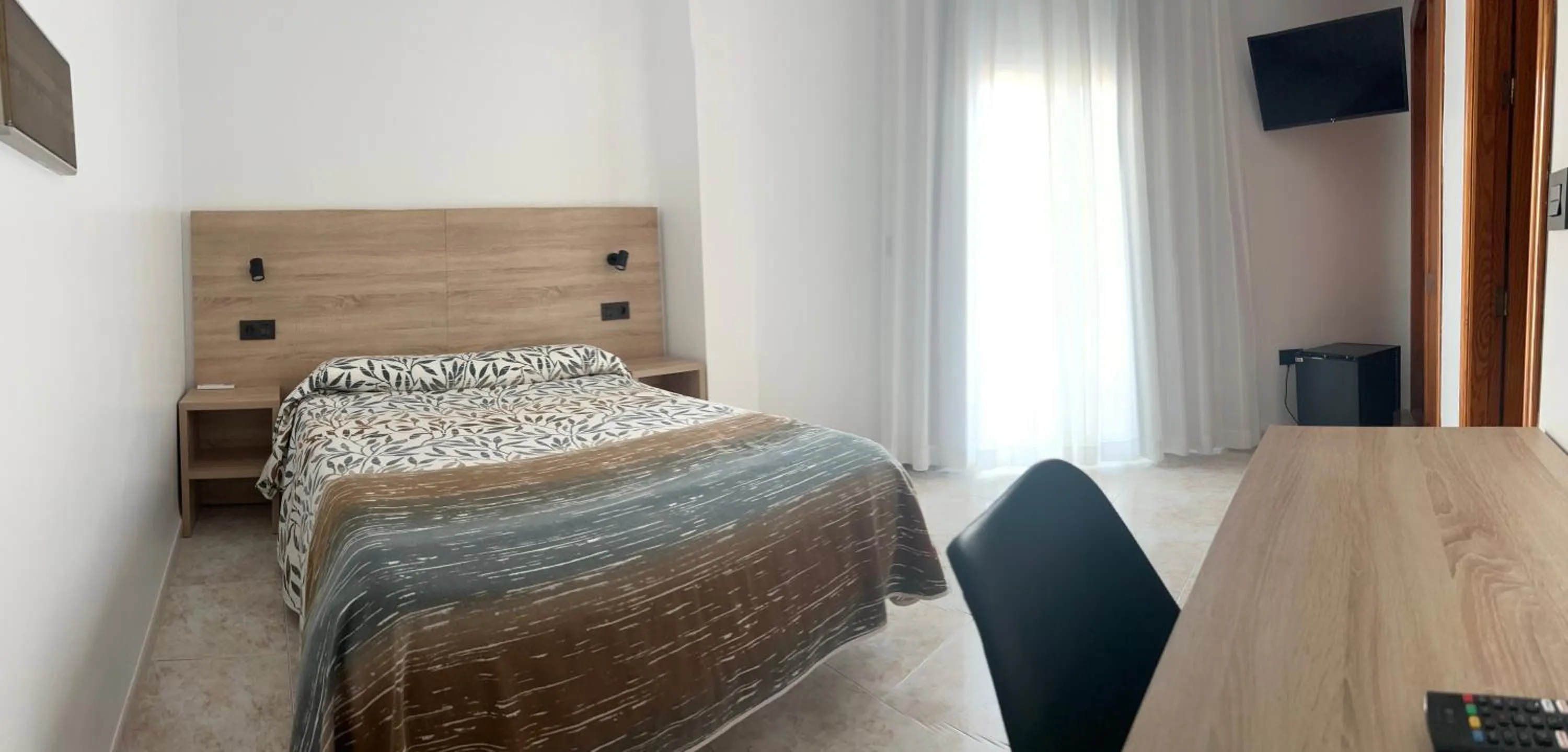 Bed in Hostal Juan Carlos