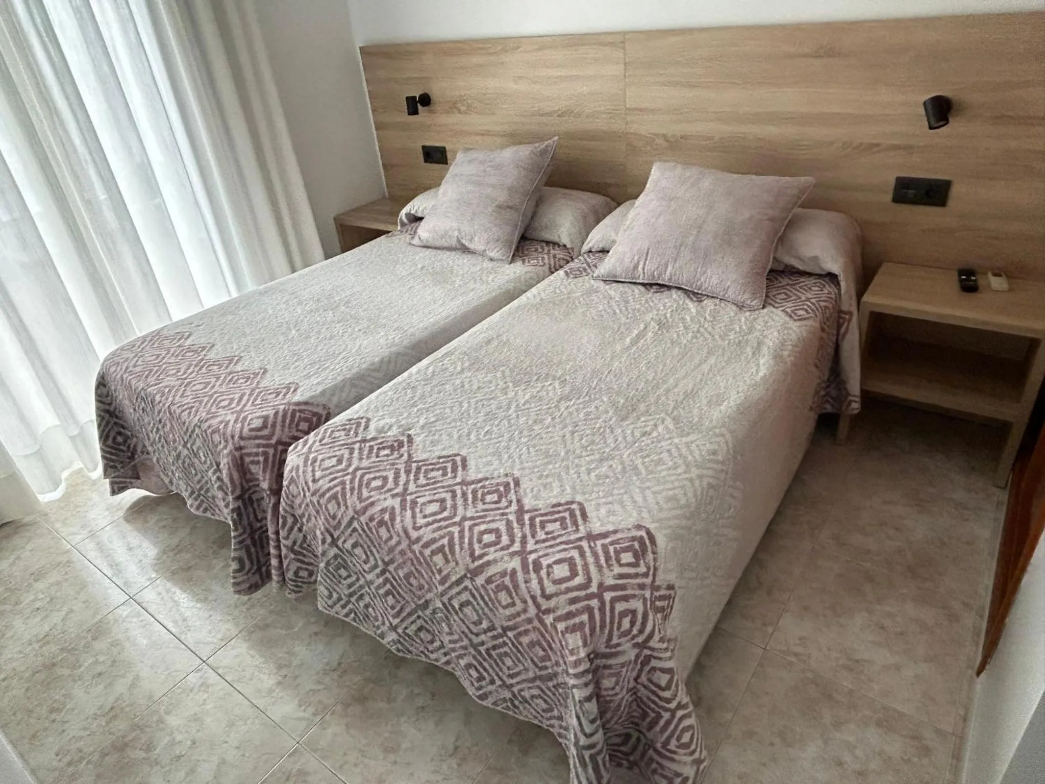 Bed in Hostal Juan Carlos