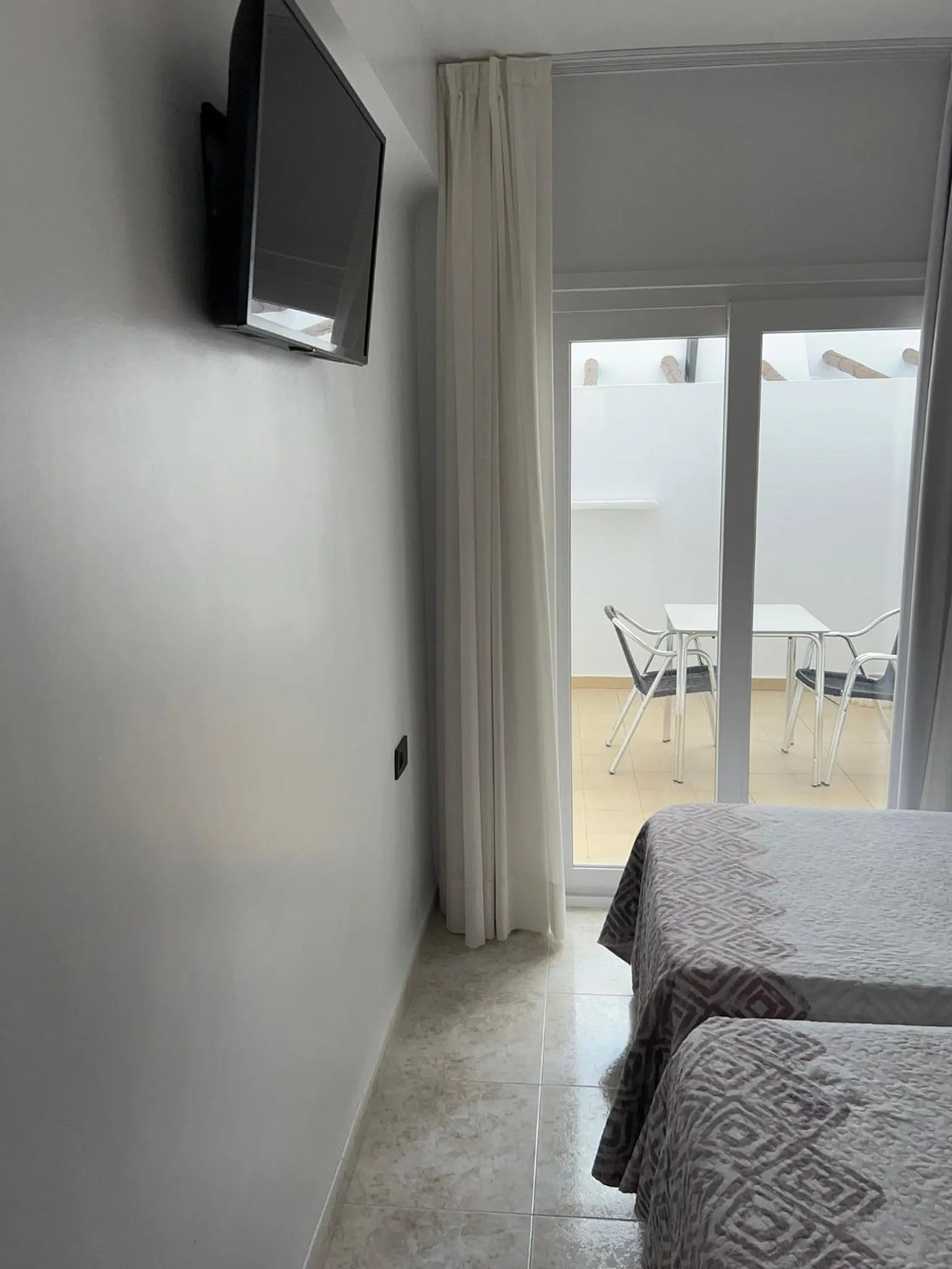 Bed in Hostal Juan Carlos