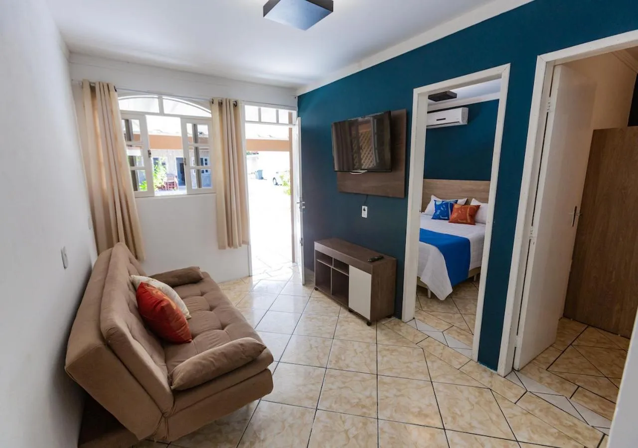 Communal lounge/ TV room, Bed in Pousada Nossa Senhora de Fatima