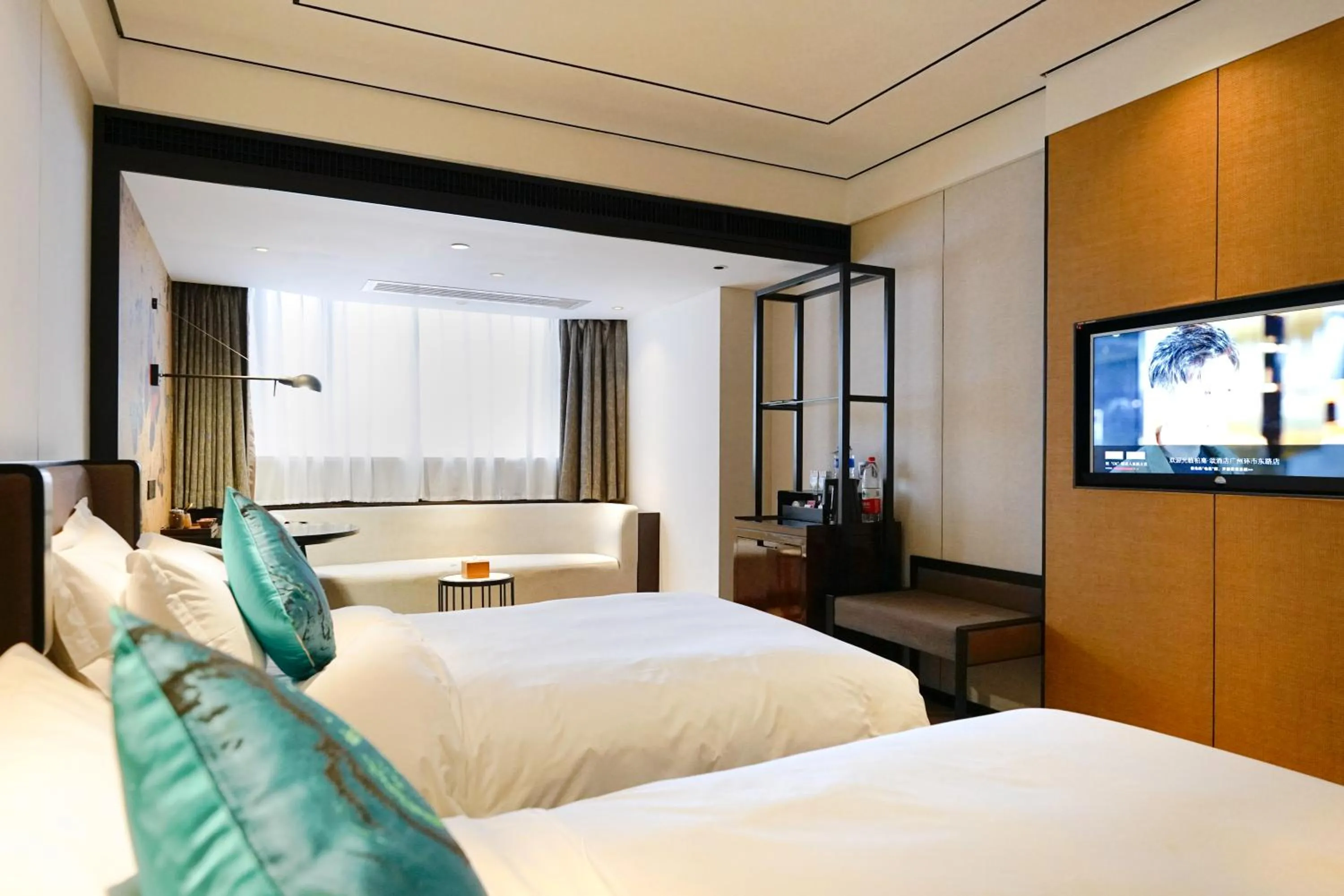 Bed in Paco Hotel GuangZhou Zoo Metro Branch