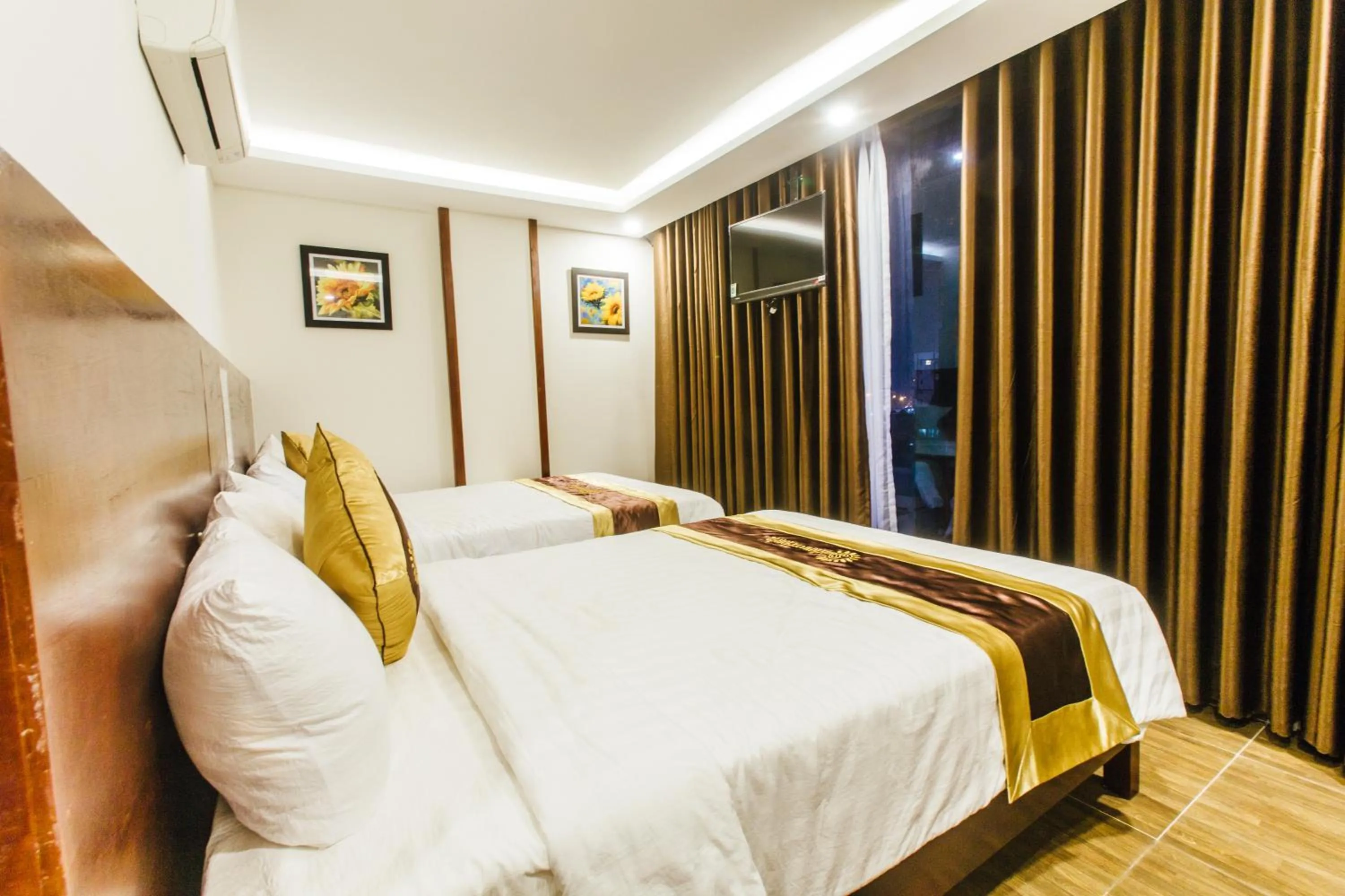 Photo of the whole room, Bed in Sunflower Hotel 2