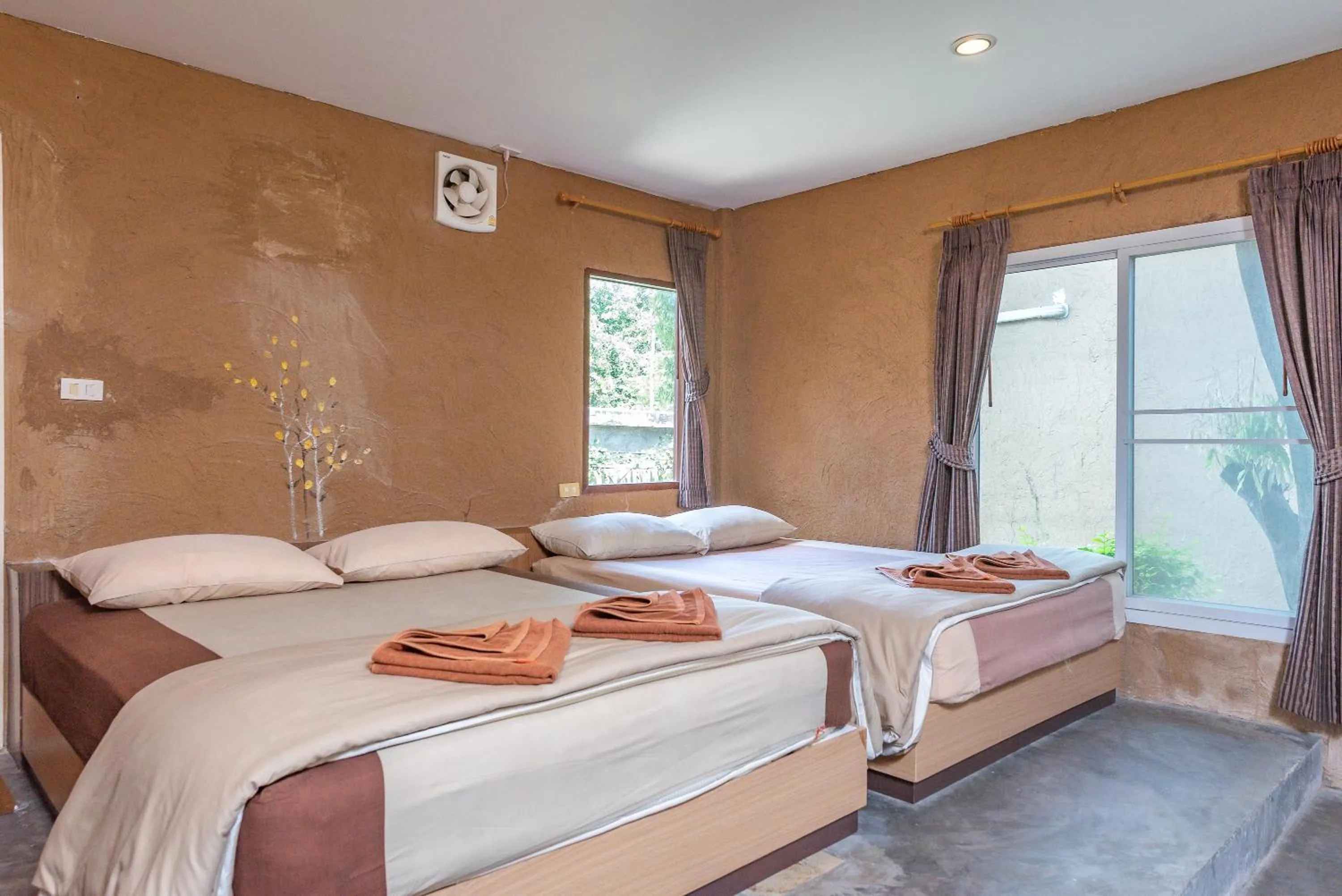 Bed in Muntra Garden Resort