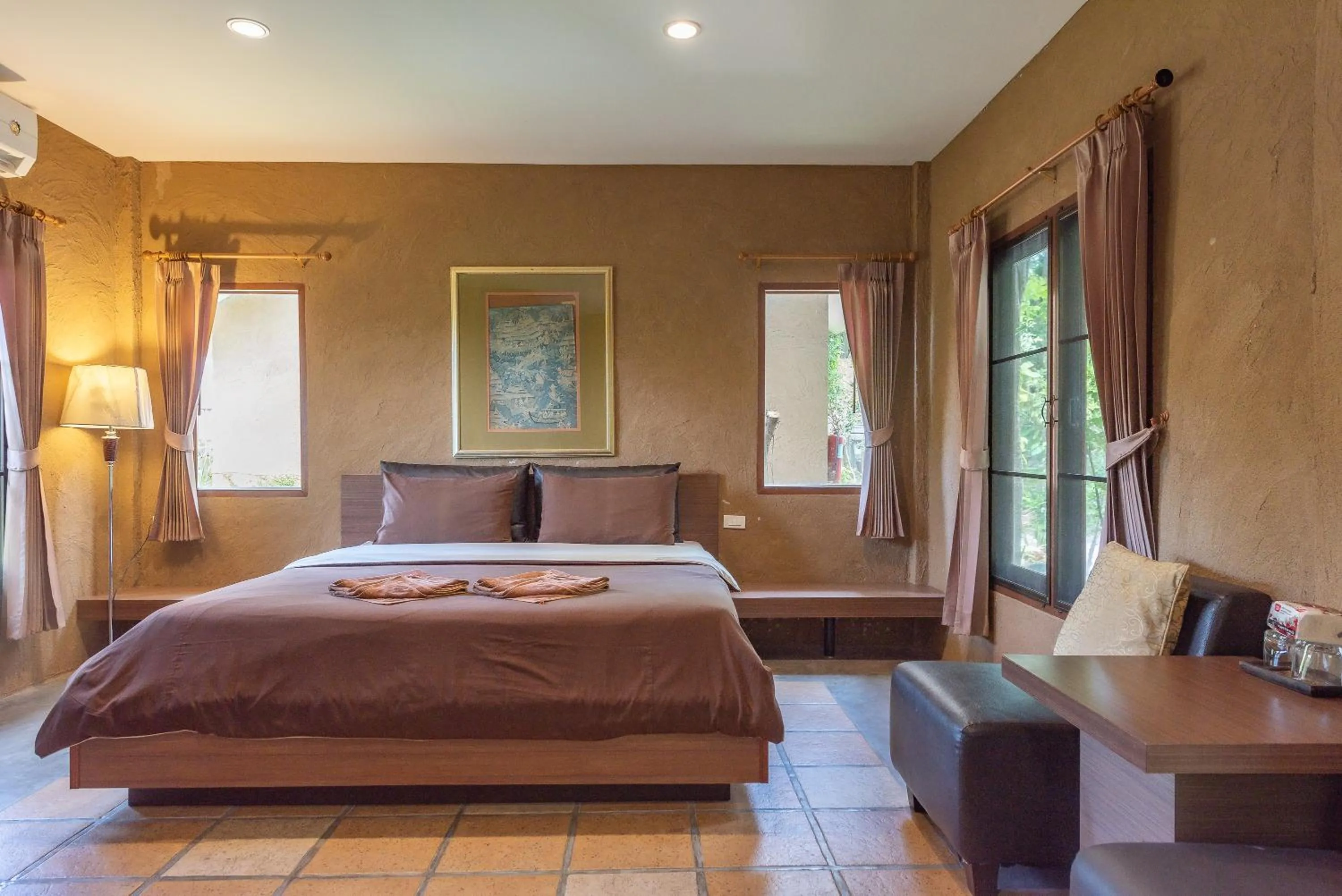 Bed in Muntra Garden Resort