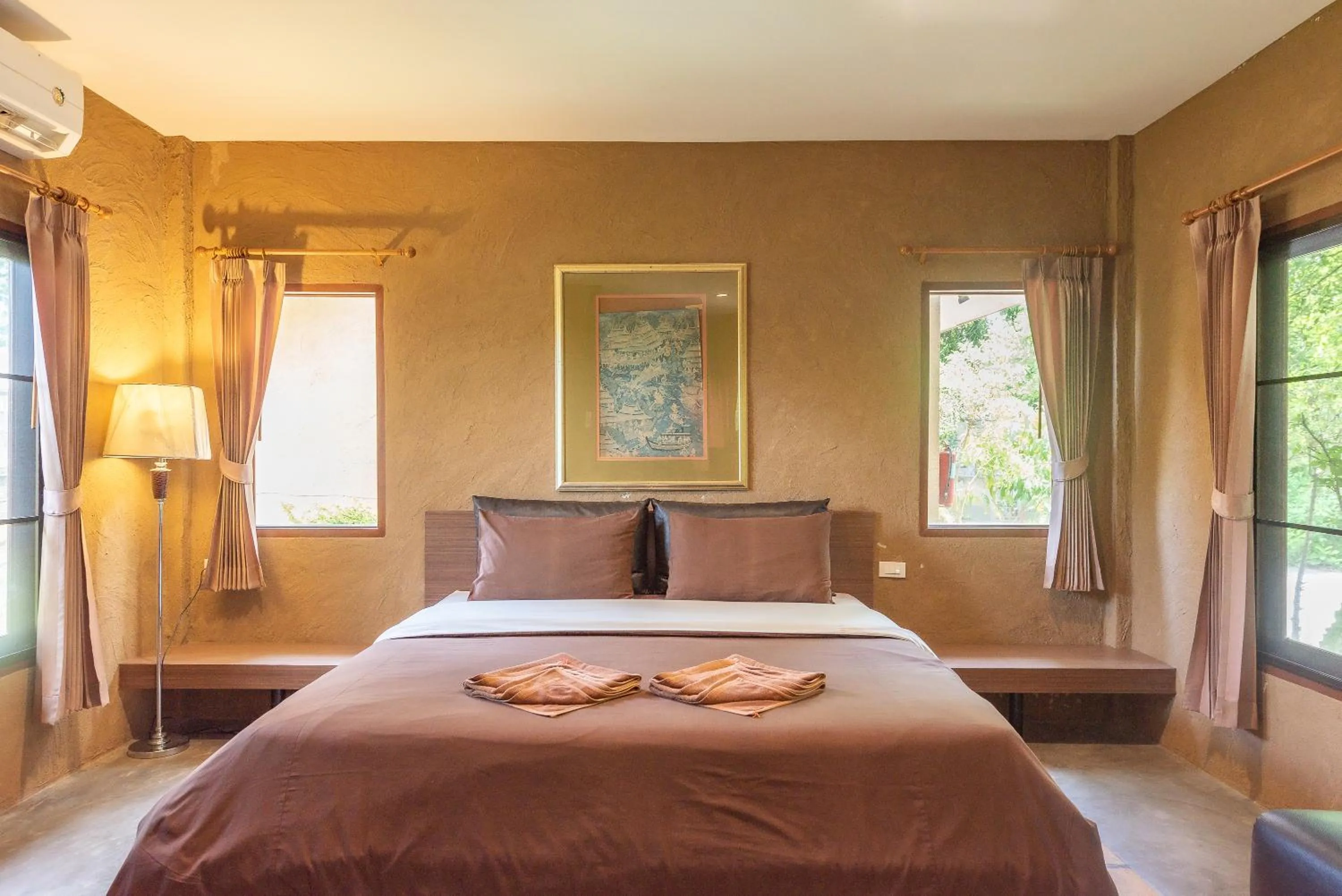 Bed in Muntra Garden Resort