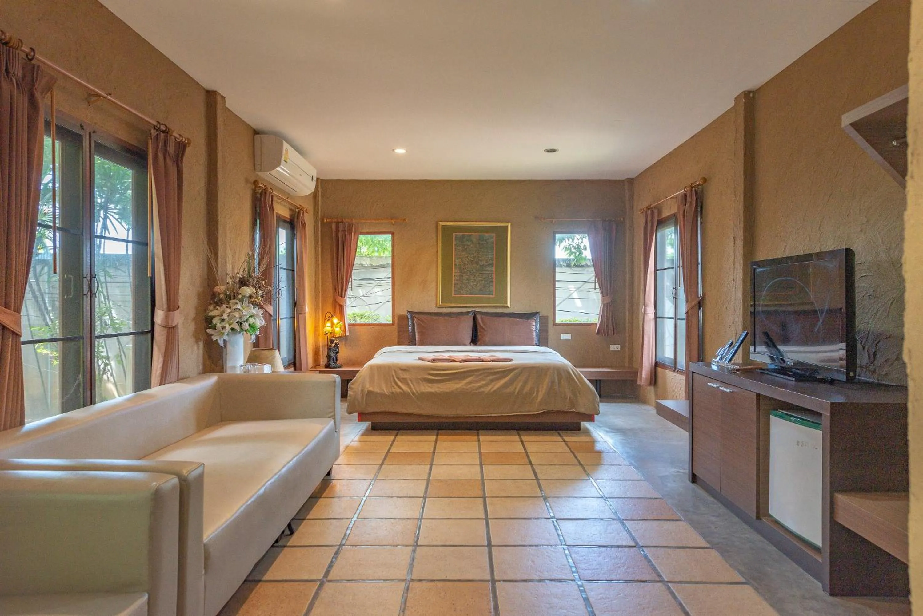 TV and multimedia, Bed in Muntra Garden Resort