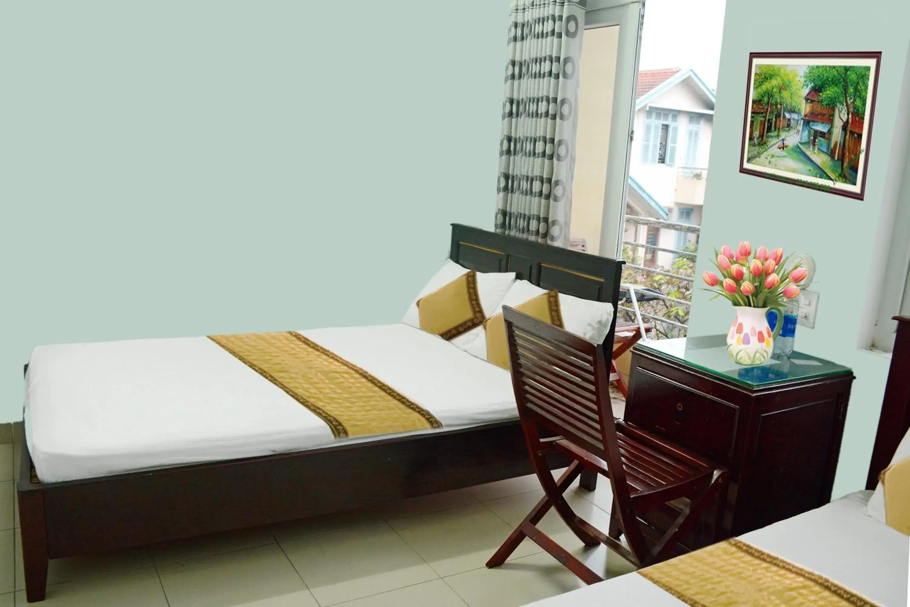 Economy Quadruple Room in Cat An Guesthouse Economy Quadruple Room in Cat An Guesthouse