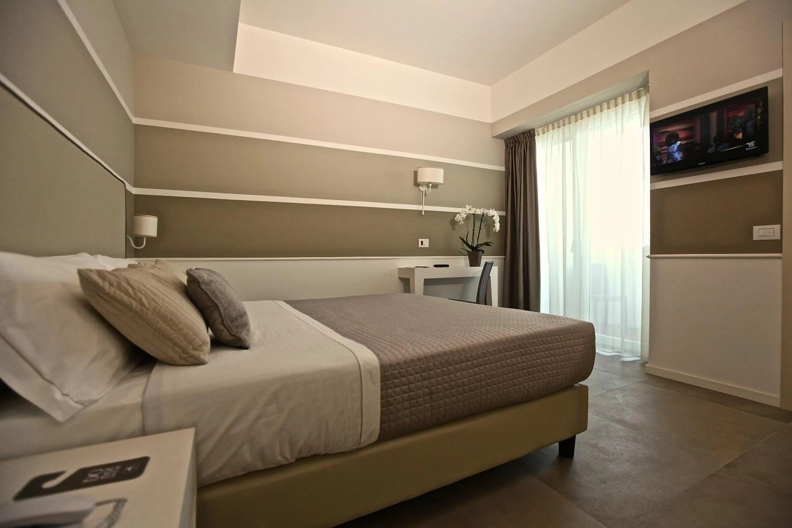 Bed in Hotel Ambassador