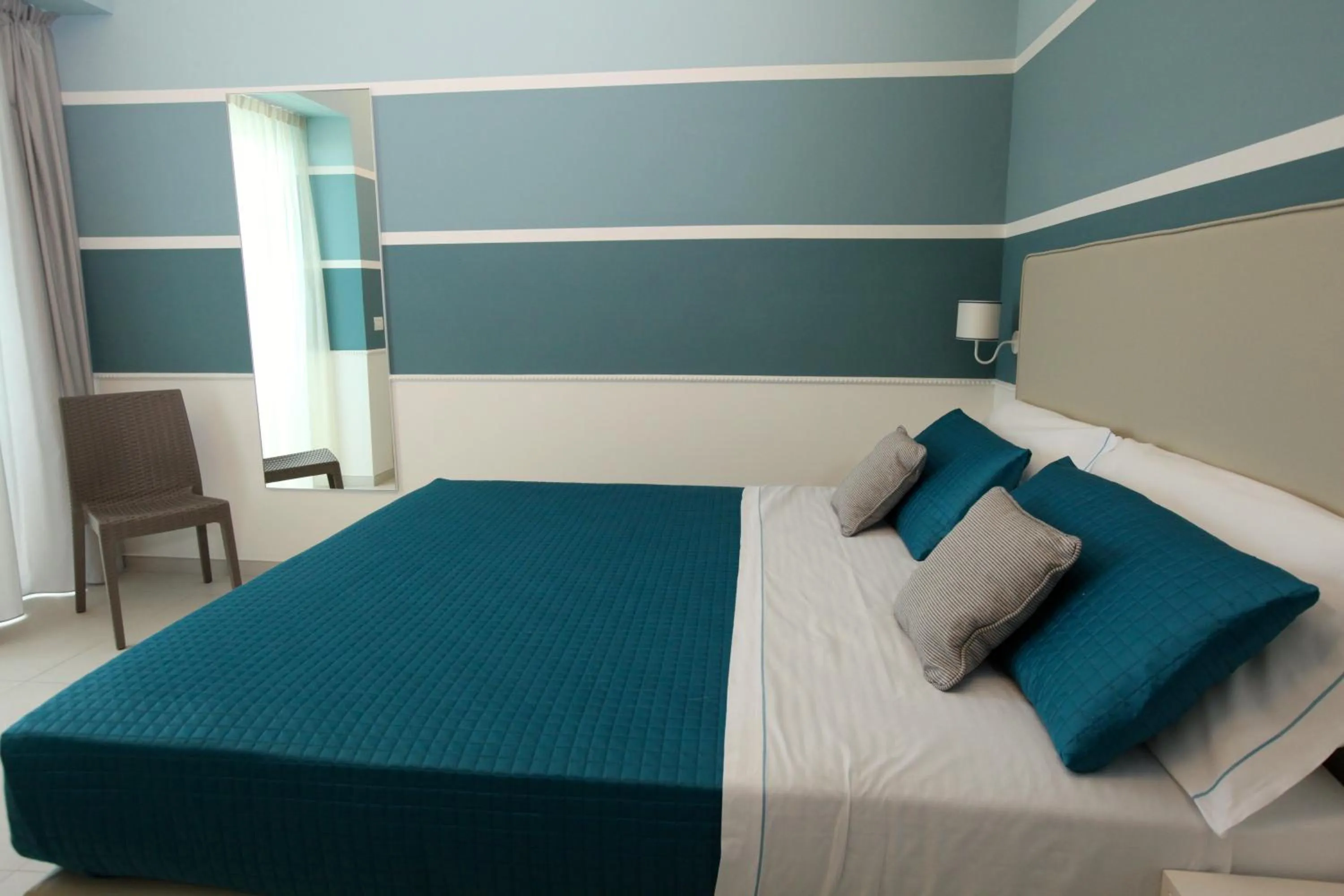 Bed in Hotel Ambassador