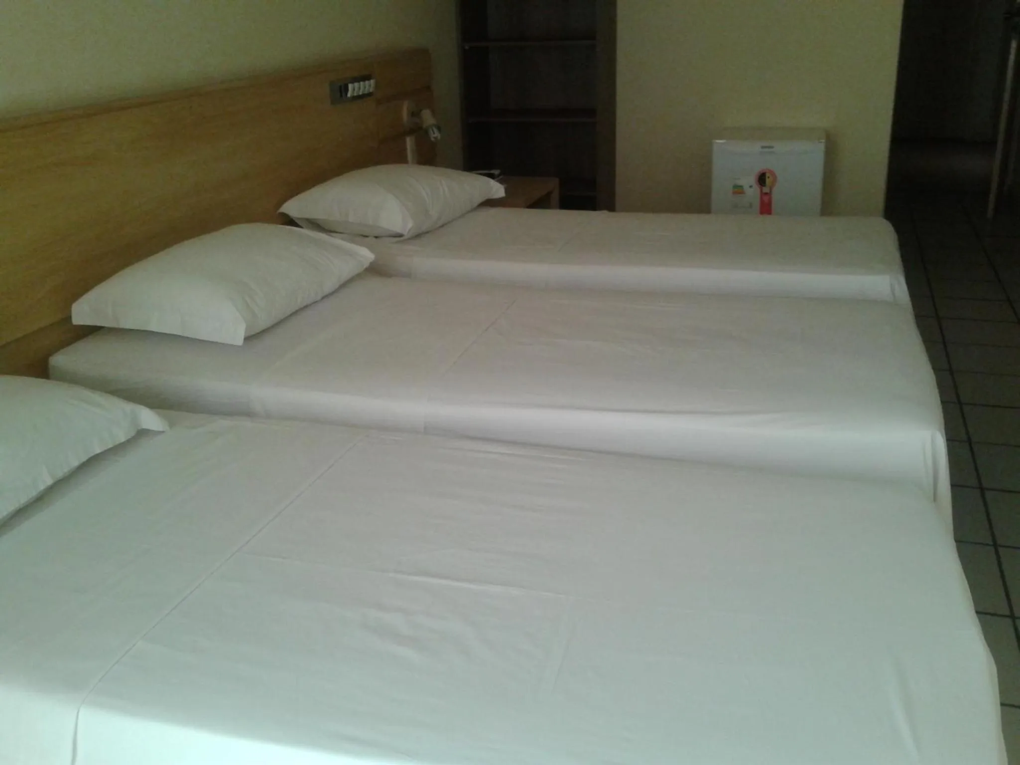 Bed in MK Express Hotel