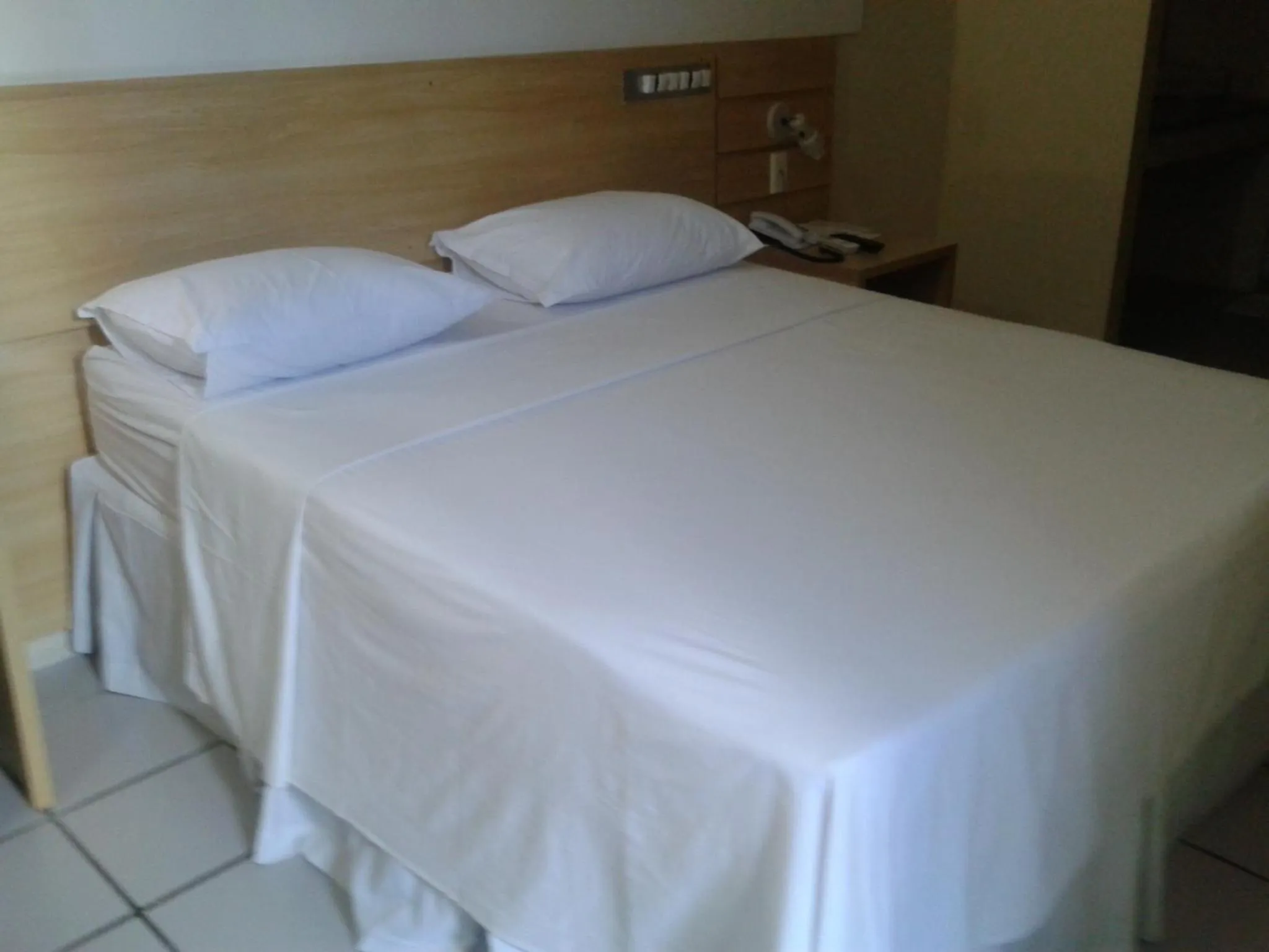 Bed in MK Express Hotel